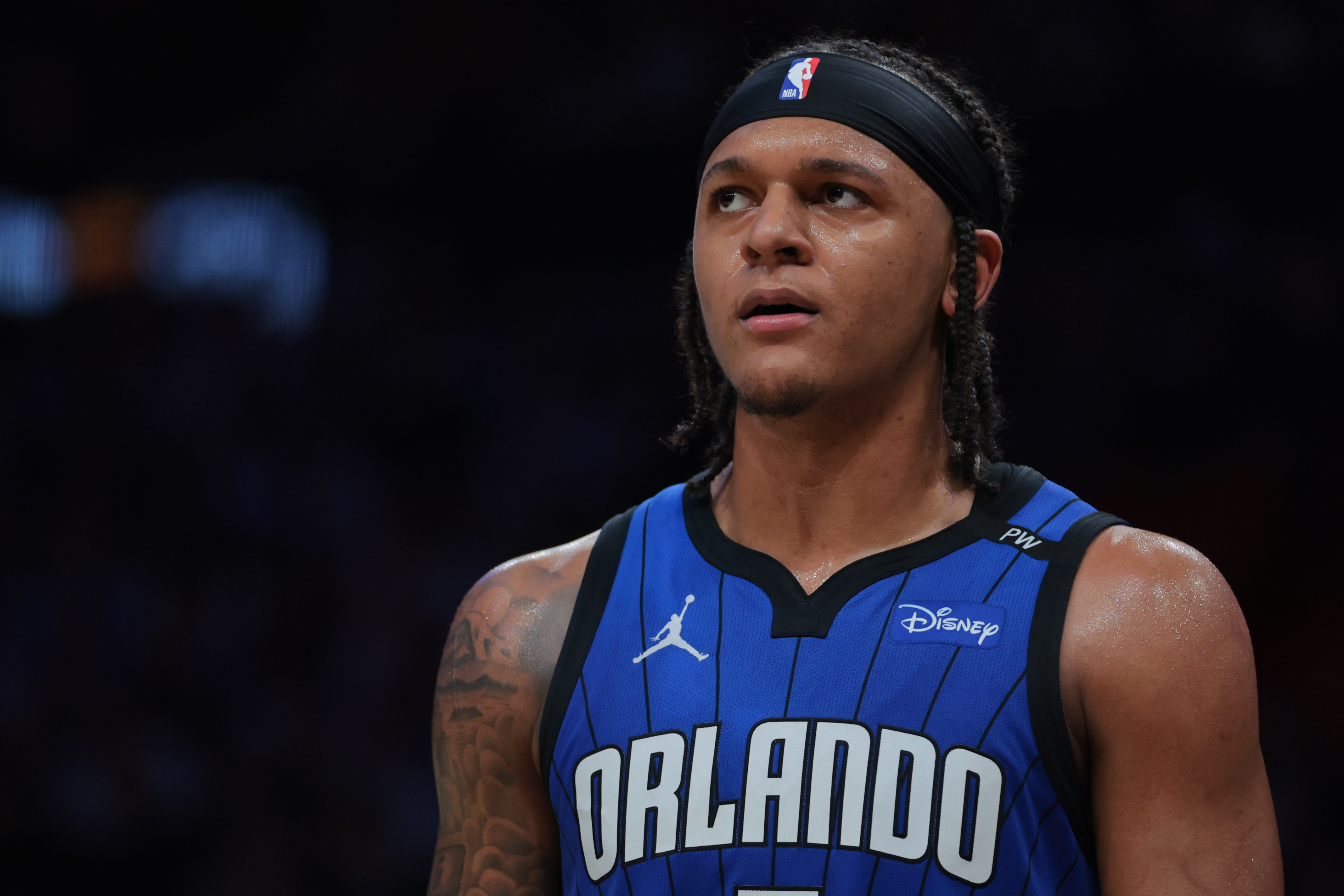 Orlando Magic forward Paolo Banchero (5), seen here looking on, is featured in our Magic vs. Clippers player props tonight.