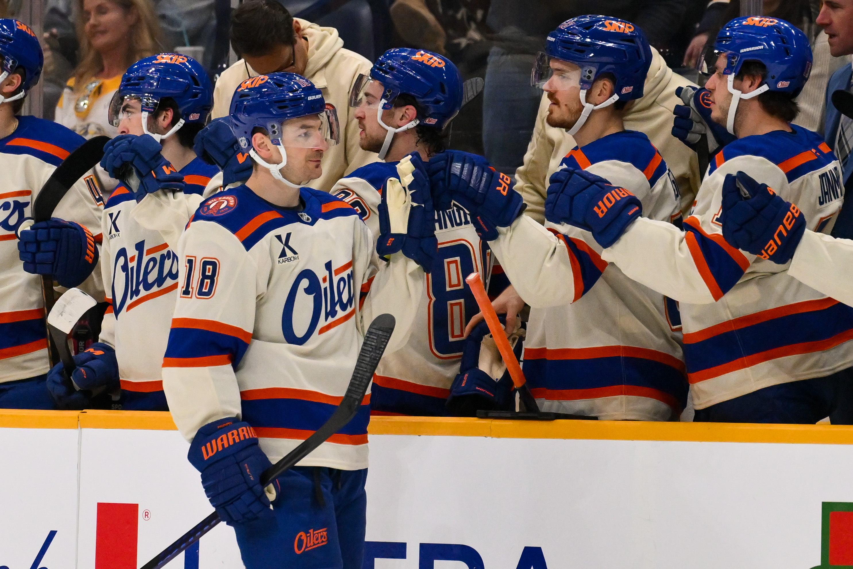 Edmonton Oilers left wing Zach Hyman (18), seen here celebrating with his teammates after scoring a goal, is featured in our NHL player props and best bets today.
