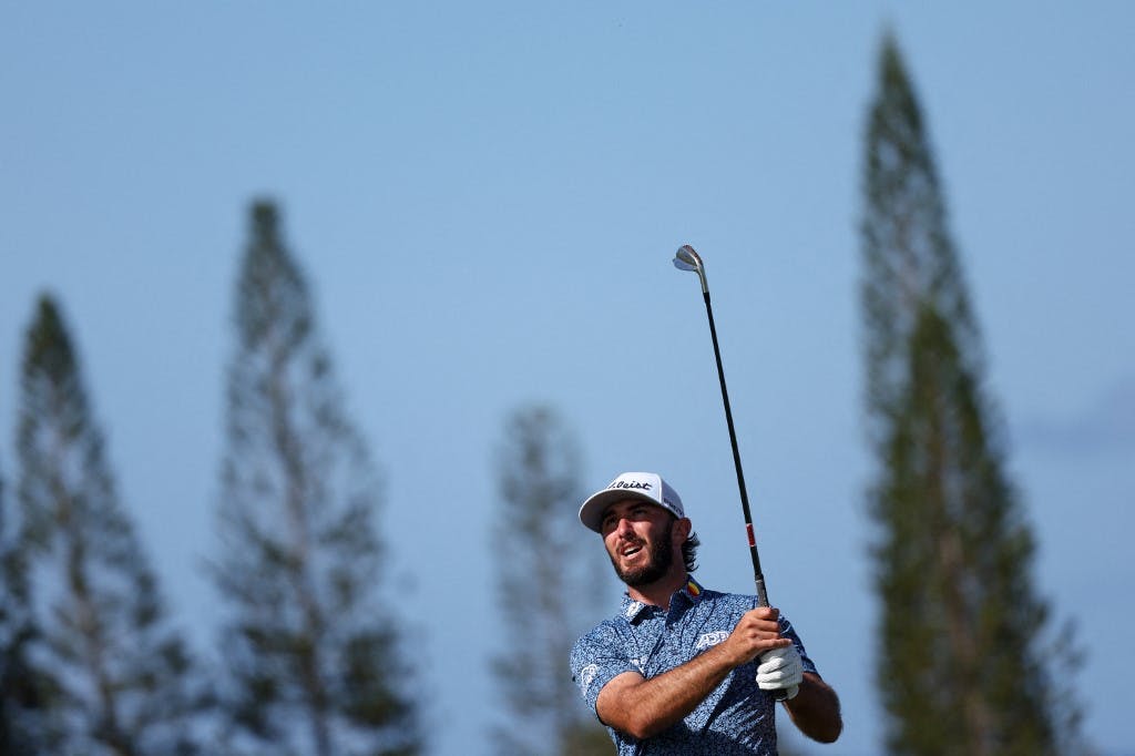 Max Homa of the United States plays a second shot on the third hole during the second round of the Sentry Tournament of Champions at Plantation Course at Kapalua Golf Club on January 06, 2023 in Lahaina, Hawaii. Photo by Harry How/Getty Images via AFP.