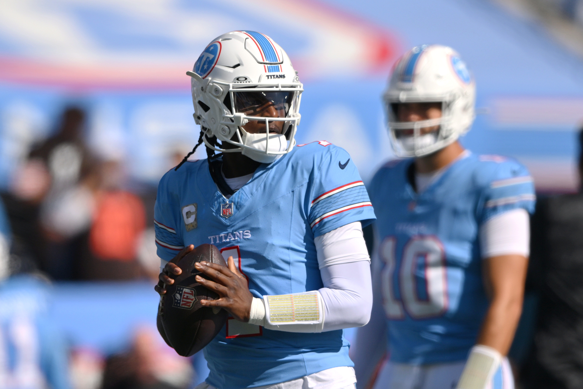 Tennessee Titans quarterback Cam Ward (1) warms up as we break down our Titans vs. Bengals prediction.