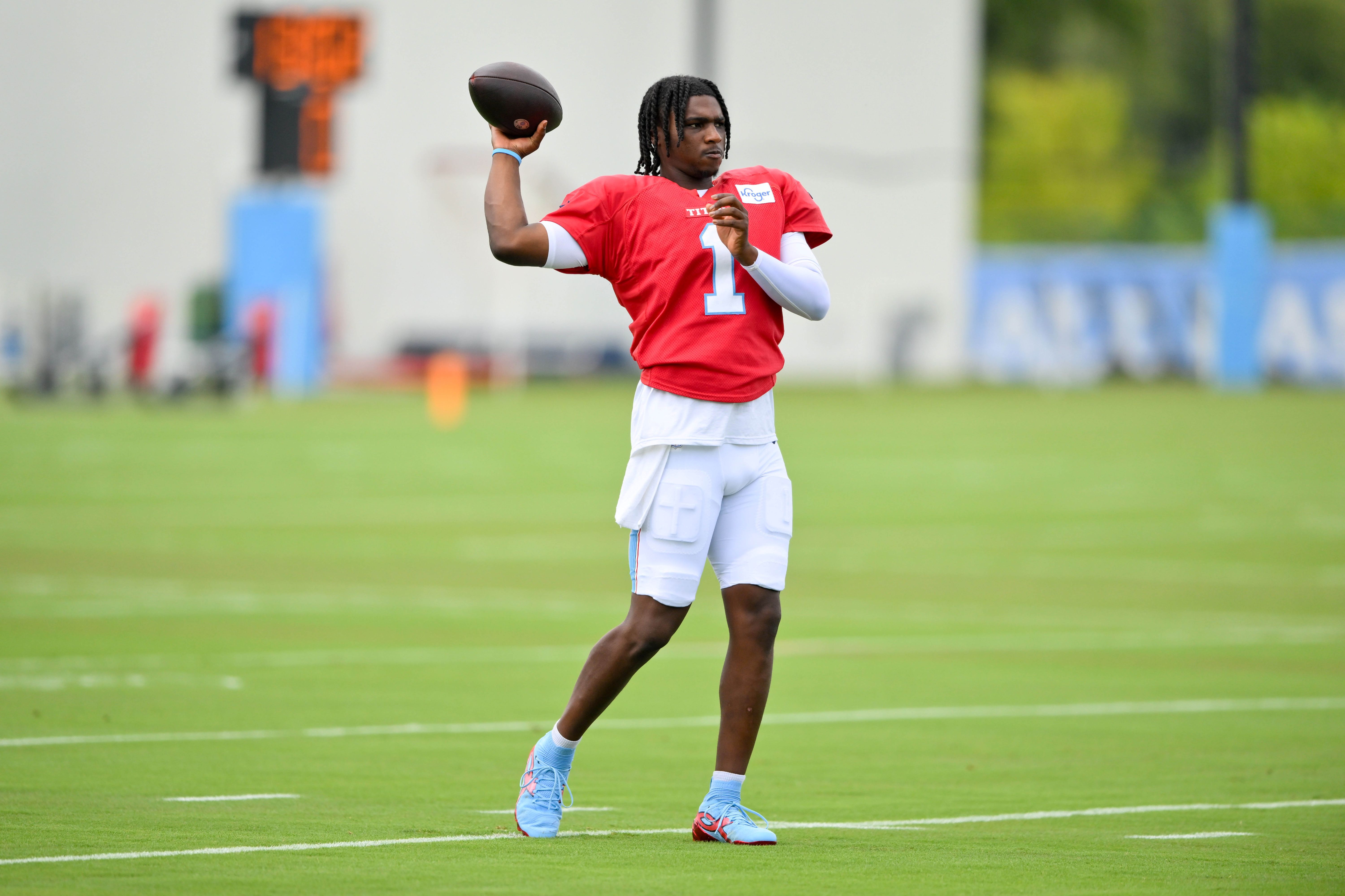 Tennessee Titans quarterback Cam Ward throws a pass during training camp as we make our best Titans vs. 49ers prediction for the NFL preseason.