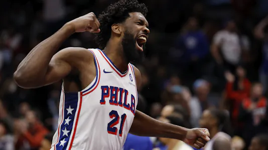 Philadelphia 76ers center Joel Embiid celebrates as we make our best NBA player prop predictions