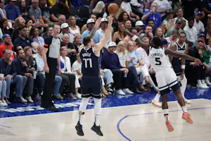 Luka Doncic of the Dallas Mavericks attempts a shot against Anthony Edwards of the Minnesota Timberwolves during Game 4 of the Western Conference Finals. We're backing Doncic in our Mavericks vs. Timberwolves Player Props. 