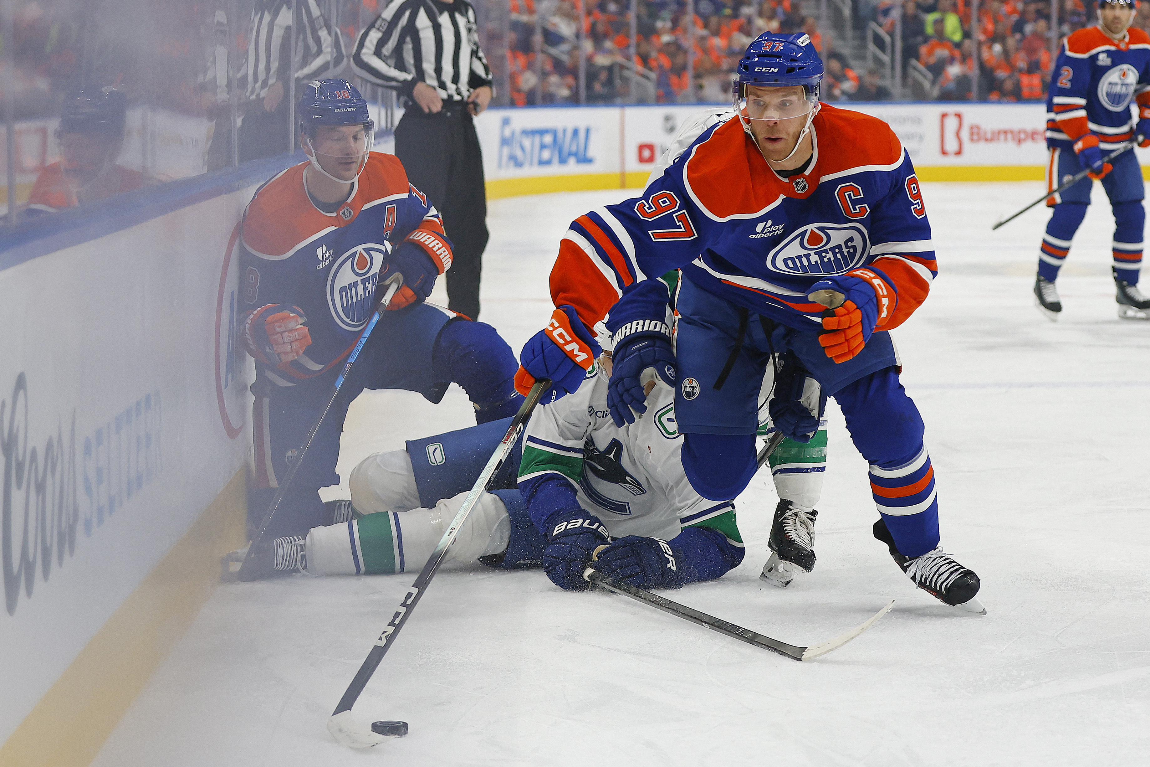 Edmonton Oilers forward Connor McDavid (97) picks up a loose puck against the Vancouver Canucks as we take a closer look at the 2027 Hart Trophy odds