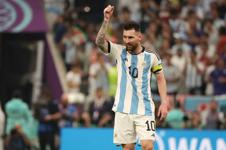 Lionel Messi of Argentina celebrates his team's third goal scored by Julian Alvarez during the FIFA World Cup 2022 semifinal football match between Argentina and Croatia on Dec. 13, 2022.