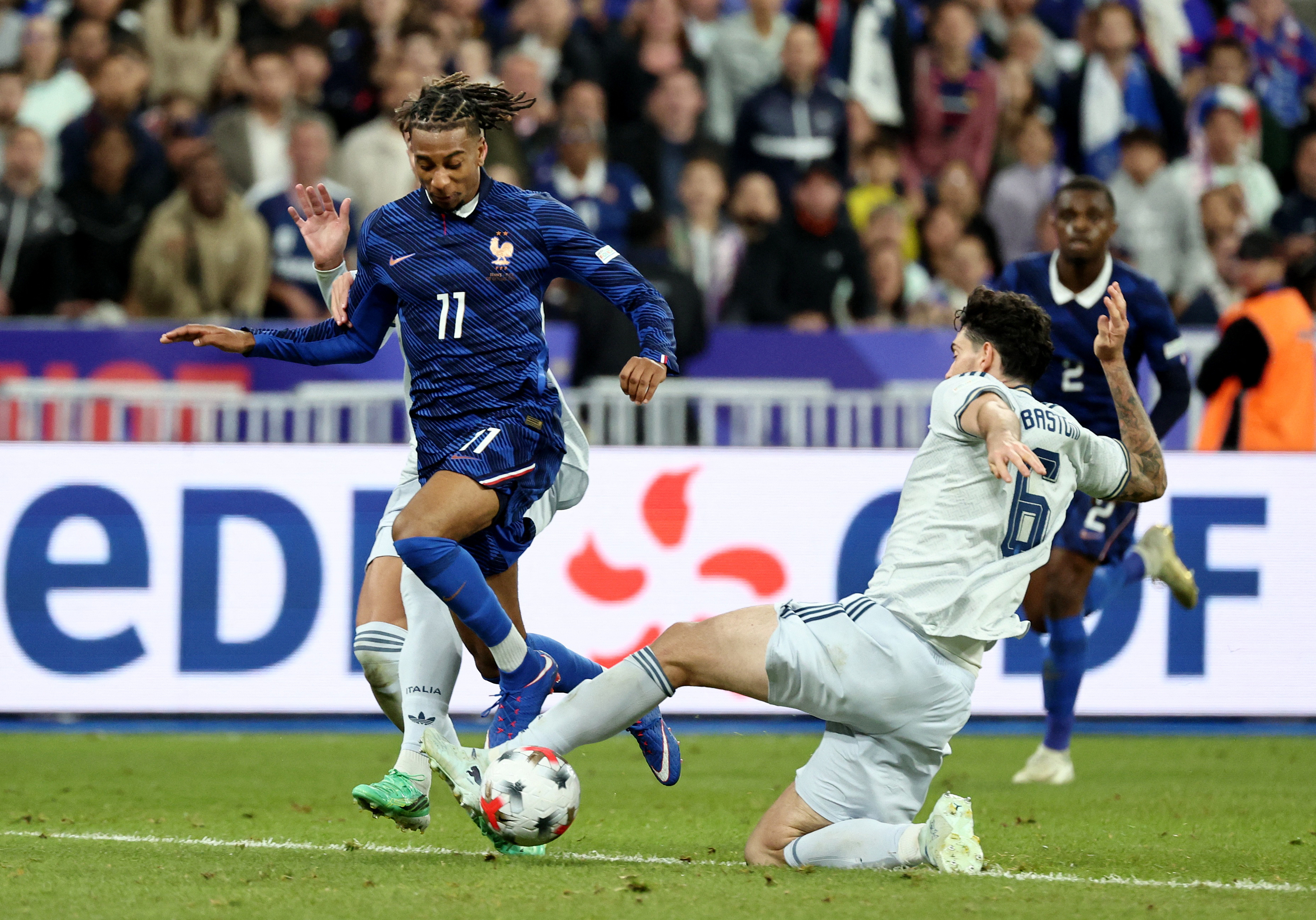Pictured: Michael Olise in action as we break down our France vs. Belgium Prediction. Photo by REUTERS/Catherine Steenkeste.