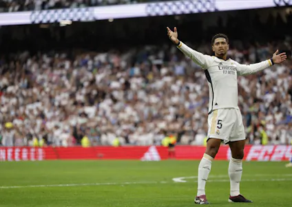 Real Madrid midfielder Jude Bellingham celebrates scoring against Cadiz CF, and we look at the top odds and predictions for the Champions League Final based on the odds at our best sports betting sites.
