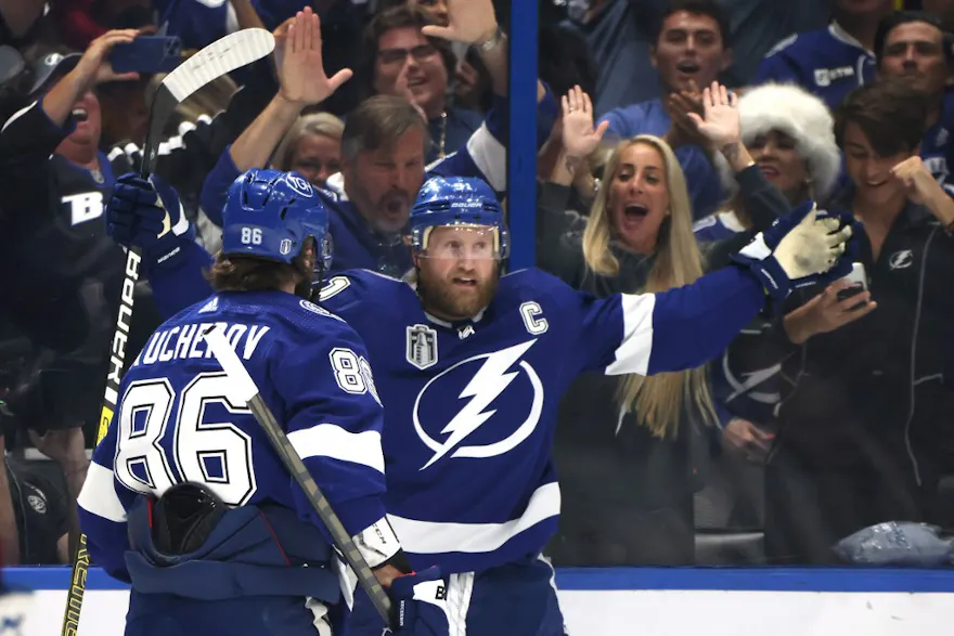 Steven Stamkos of the Tampa Bay Lightning celebrates scoring a goal with Nikita Kucherov in the first period of the game against the Colorado Avalanche in Game 6 of the 2022 NHL Stanley Cup Final.