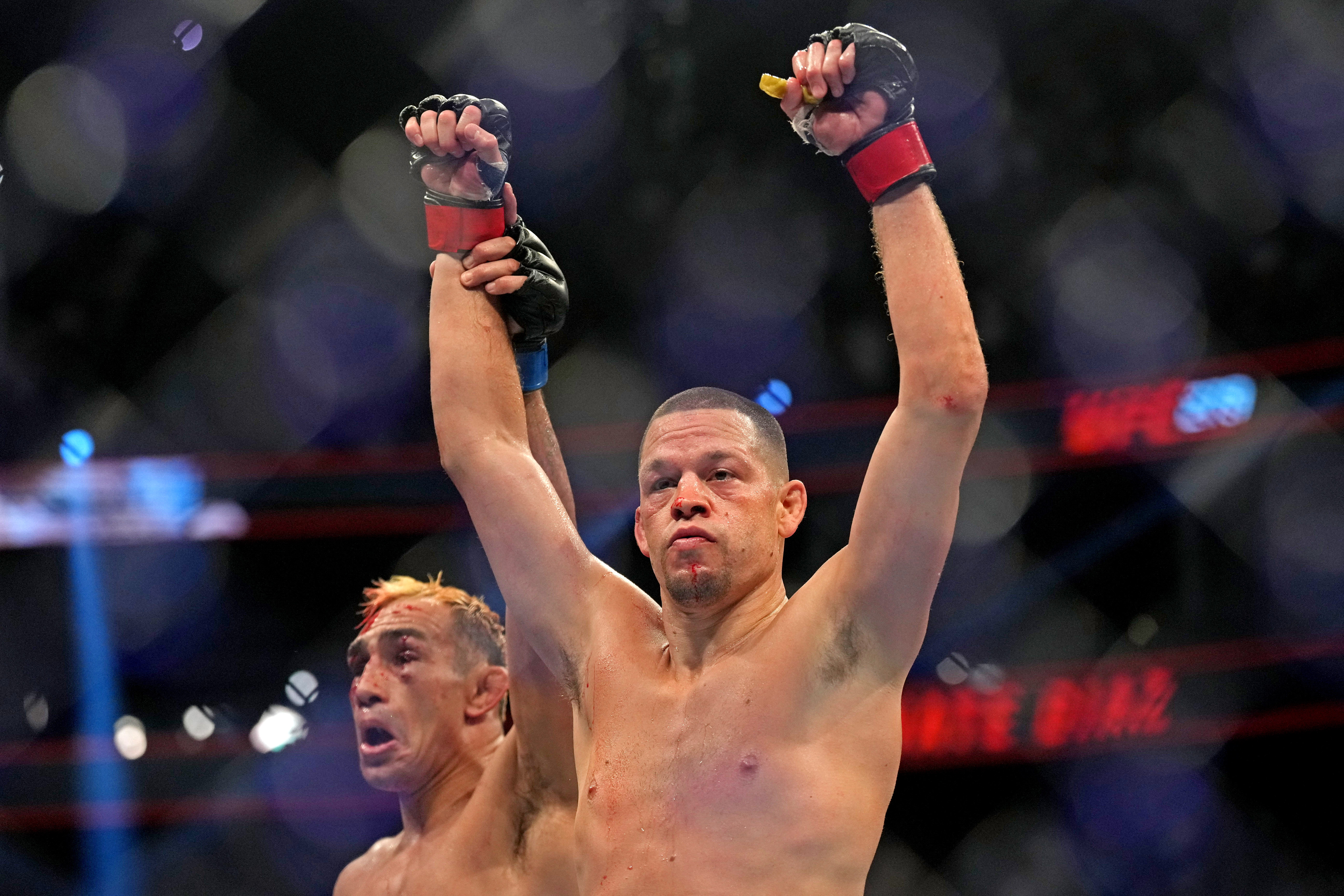 Nate Diaz celebrates as we make our best early Diaz vs. Perry predictions for the upcoming MVP card.