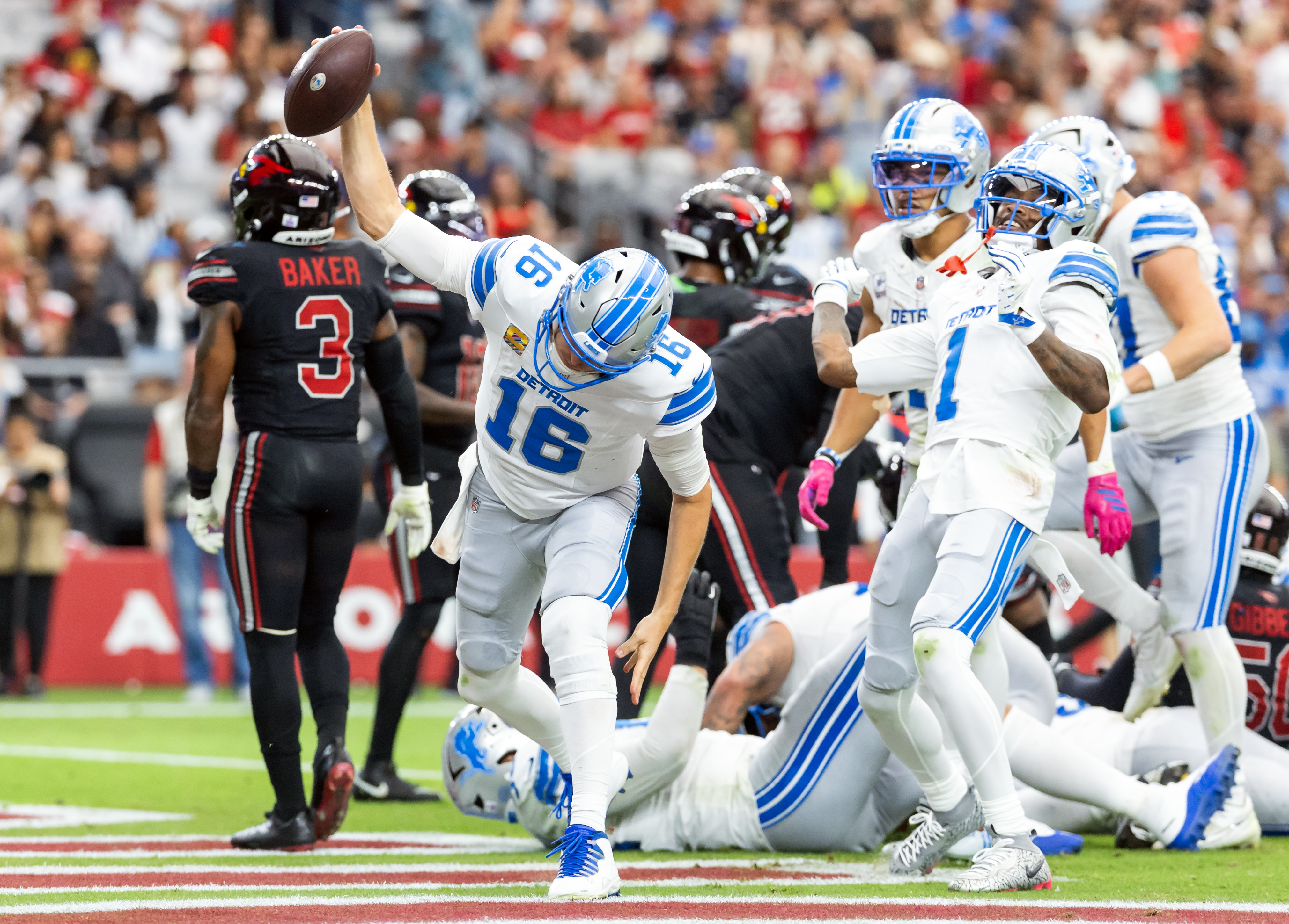 Detroit Lions quarterback Jared Goff (16) spikes the ball in celebration after scoring a touchdown against the Arizona Cardinals at State Farm Stadium, as we make our best Week 7 moneyline predictions.