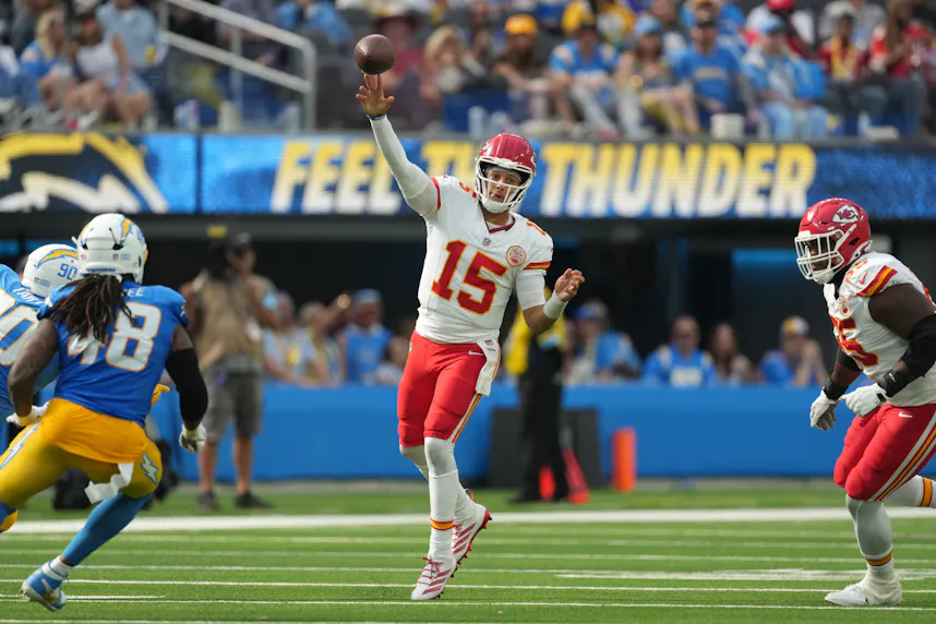 Kansas City Chiefs quarterback Patrick Mahomes throws the ball against the Los Angeles Chargers as we offer our Saints vs. Chiefs early picks.