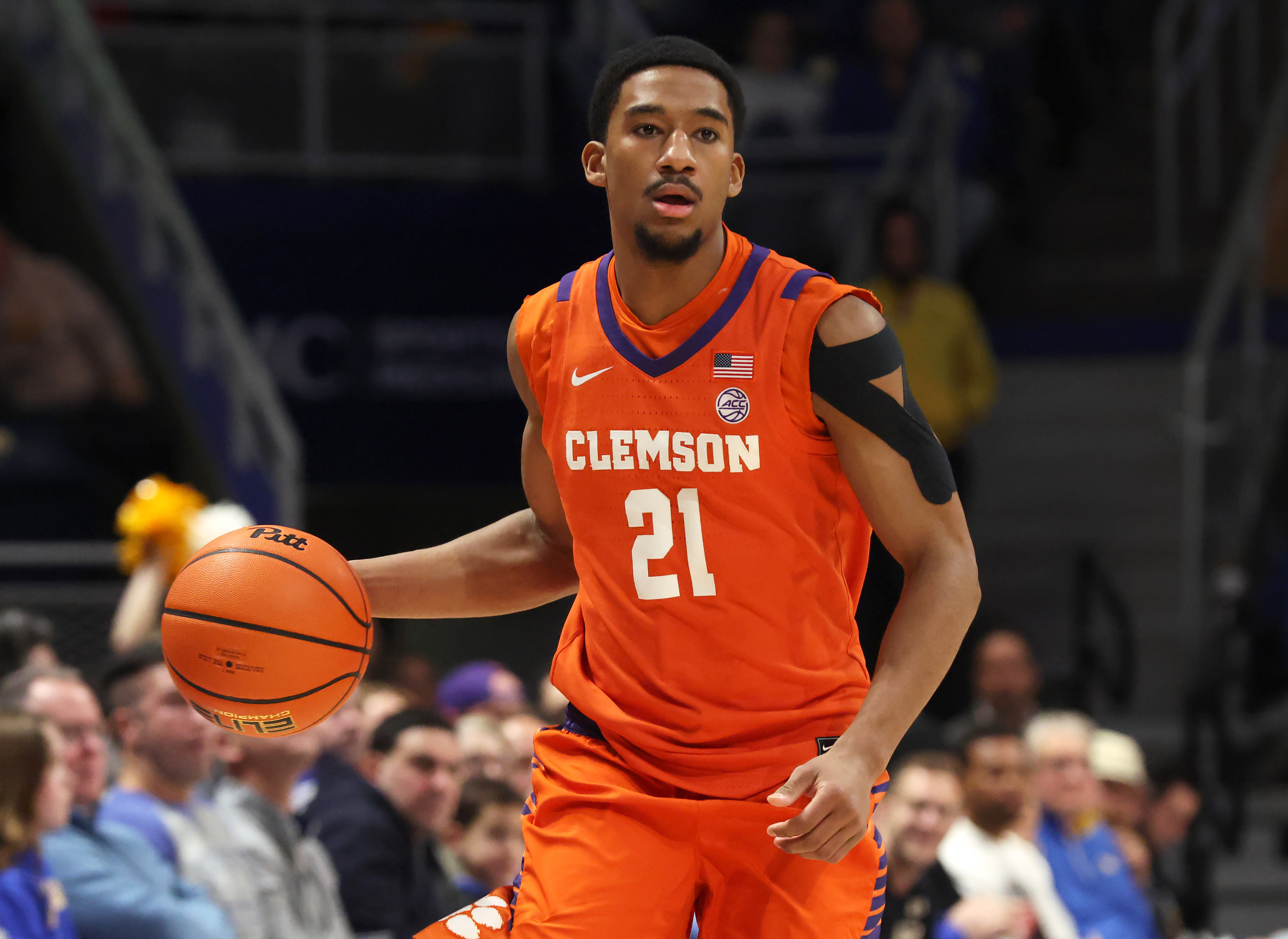 Clemson Tigers guard Ace Buckner (21), seen here bringing the ball up the court, is featured in our Iowa vs. Clemson prediction.