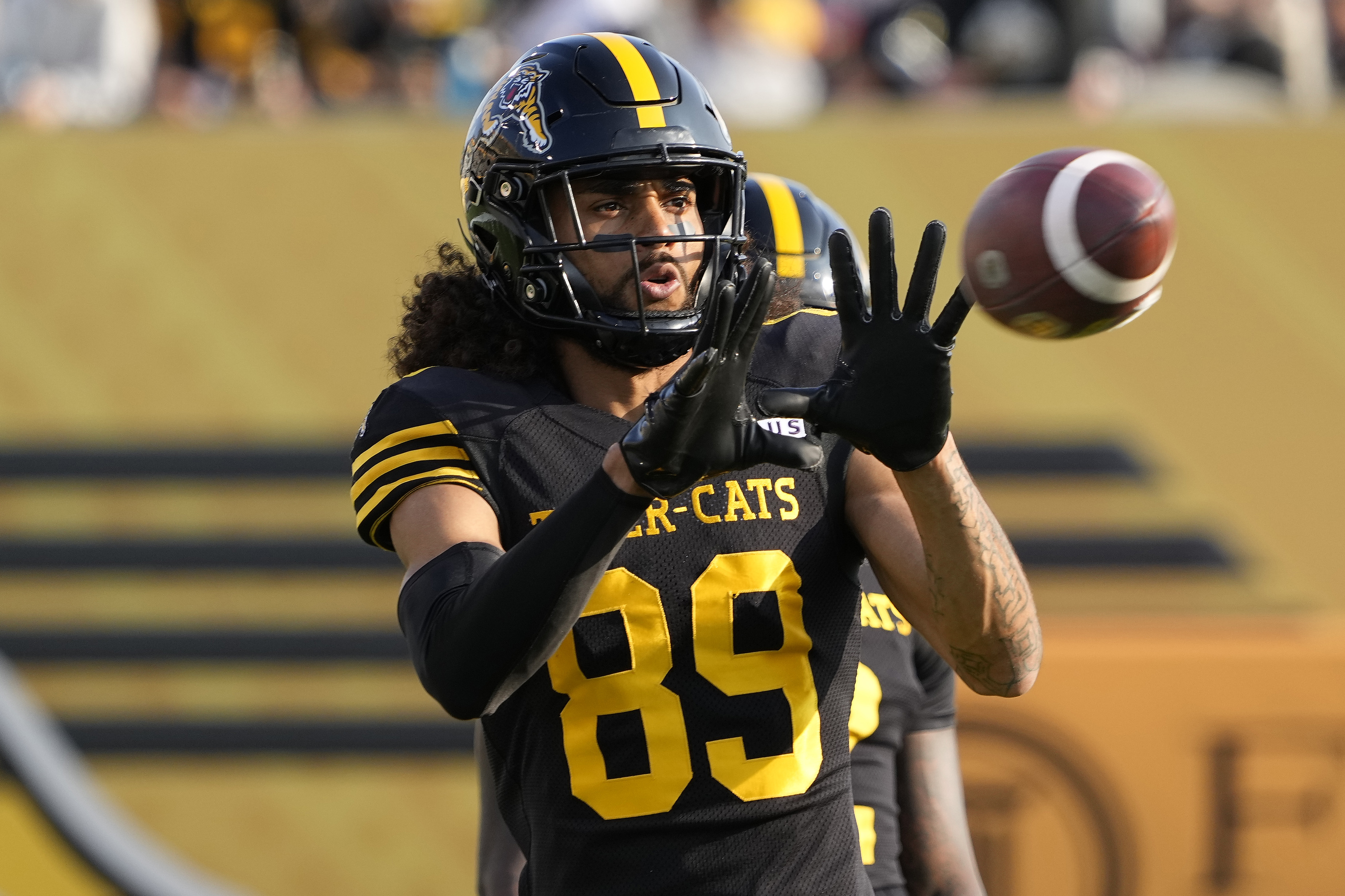 Hamilton Tiger-Cats wide receiver Kenny Lawler (89) goes to catch a pass as we break down our Tiger-Cats vs. Stampeders prediction.