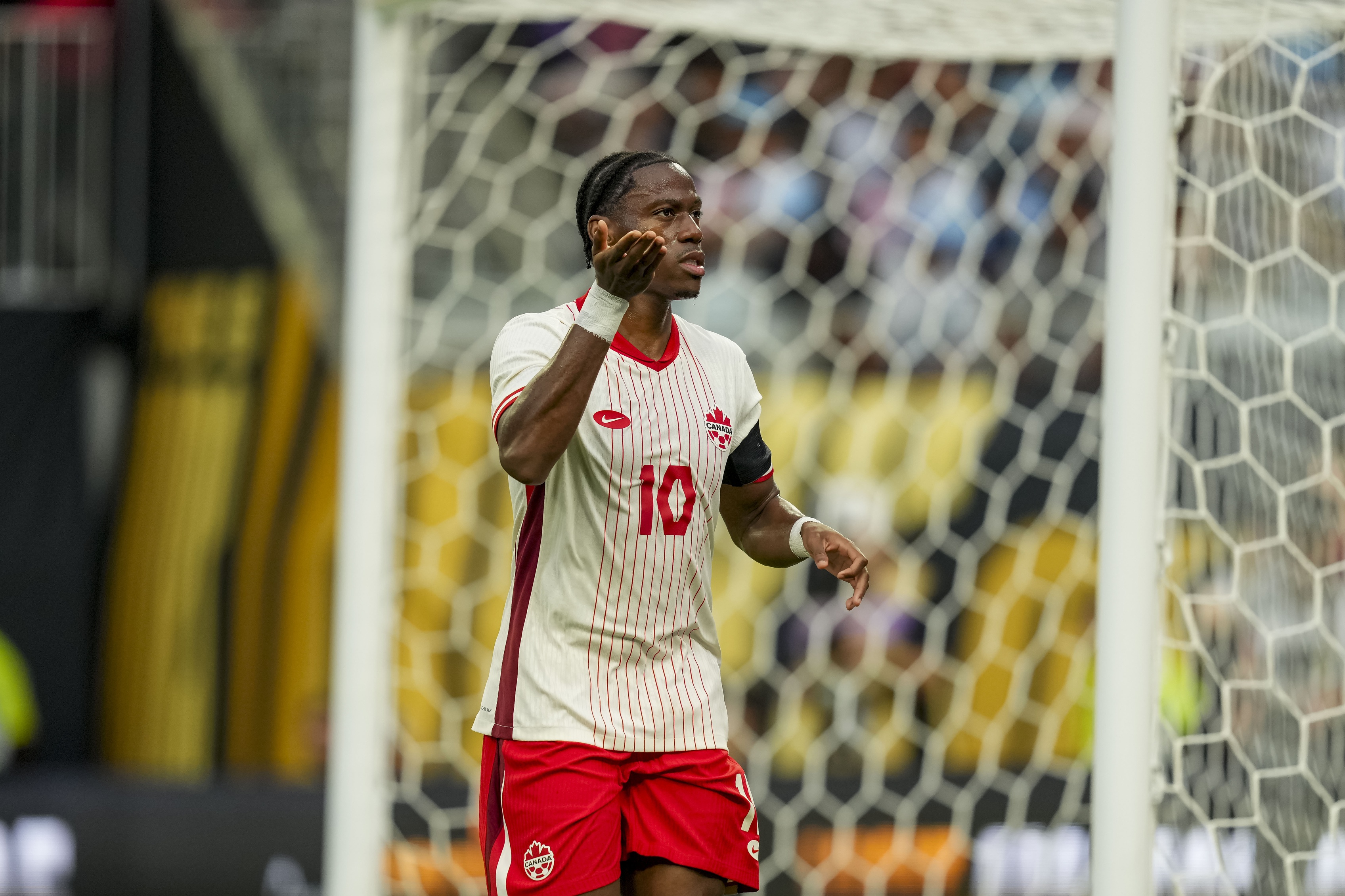 Canada forward Jonathan David (10) - who is featured in our Venezuela vs. Canada prediction, betting odds, and expert picks - scores a penalty goal.