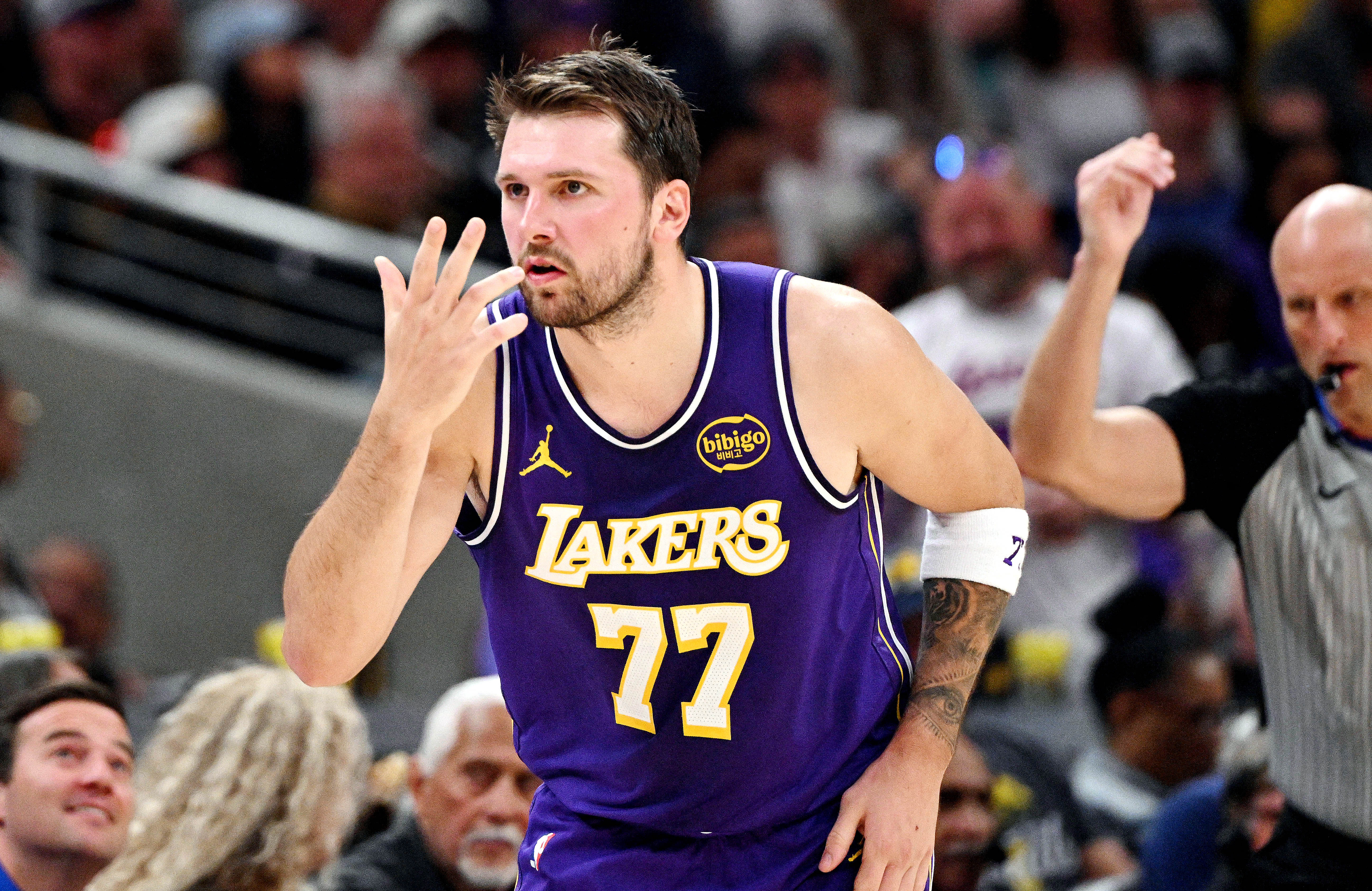 Los Angeles Lakers guard Luka Doncic (77) celebrates a three point shot as he is featured in our Lakers vs. Thunder player props.