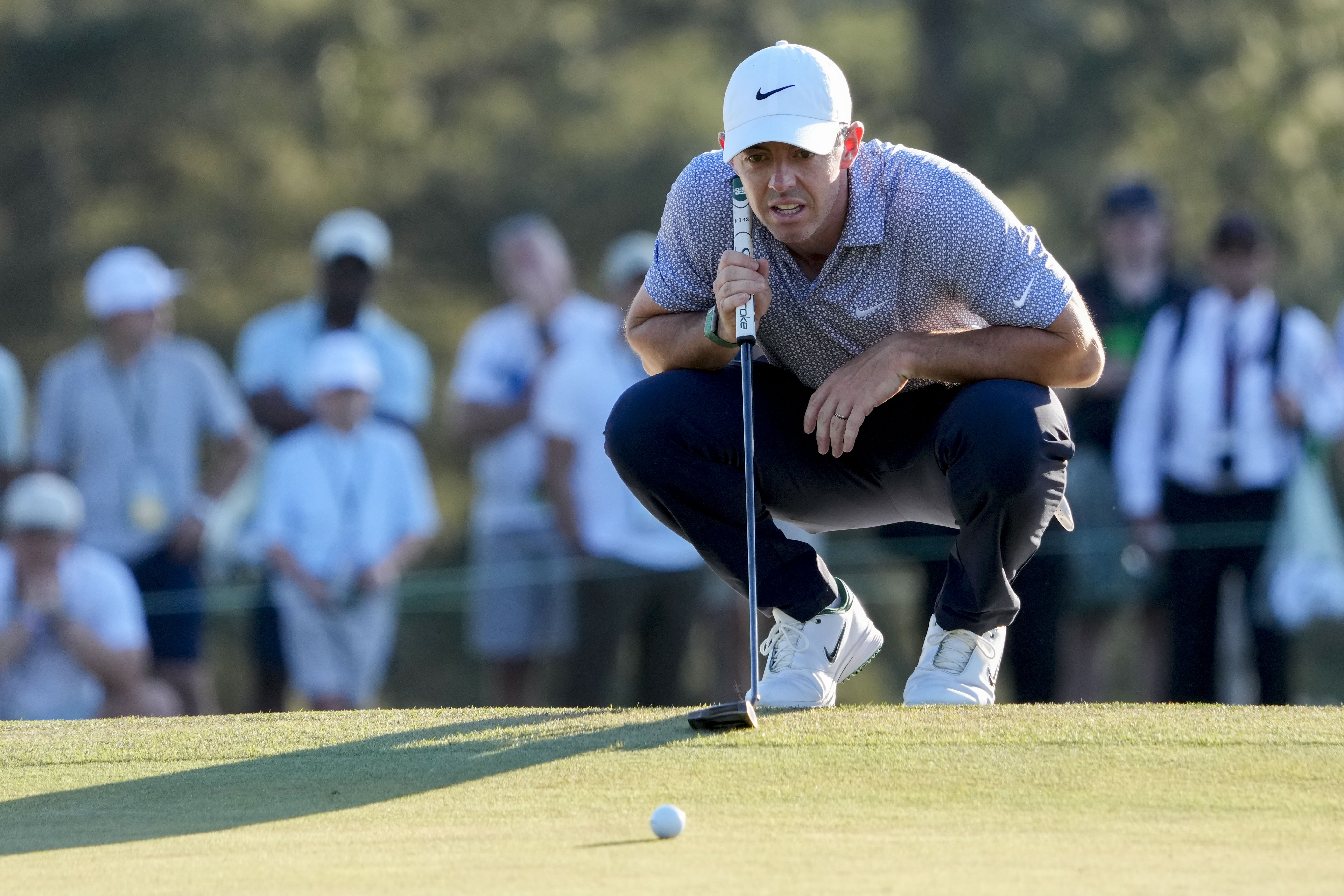 Rory McIlroy lines up his putt as we make our best Masters Round 4 picks and predictions. 