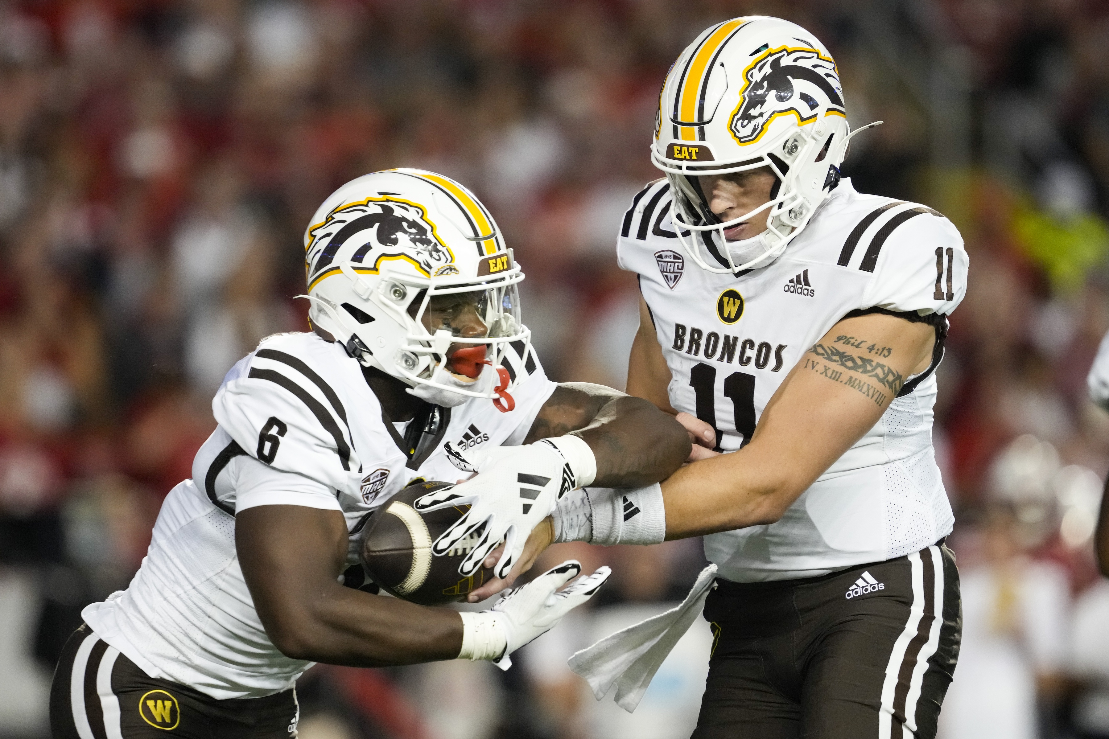Western Michigan Broncos quarterback Hayden Wolff hands the football off to running back Jalen Buckley as we look at our Kennesaw State vs. Western Michigan predictions