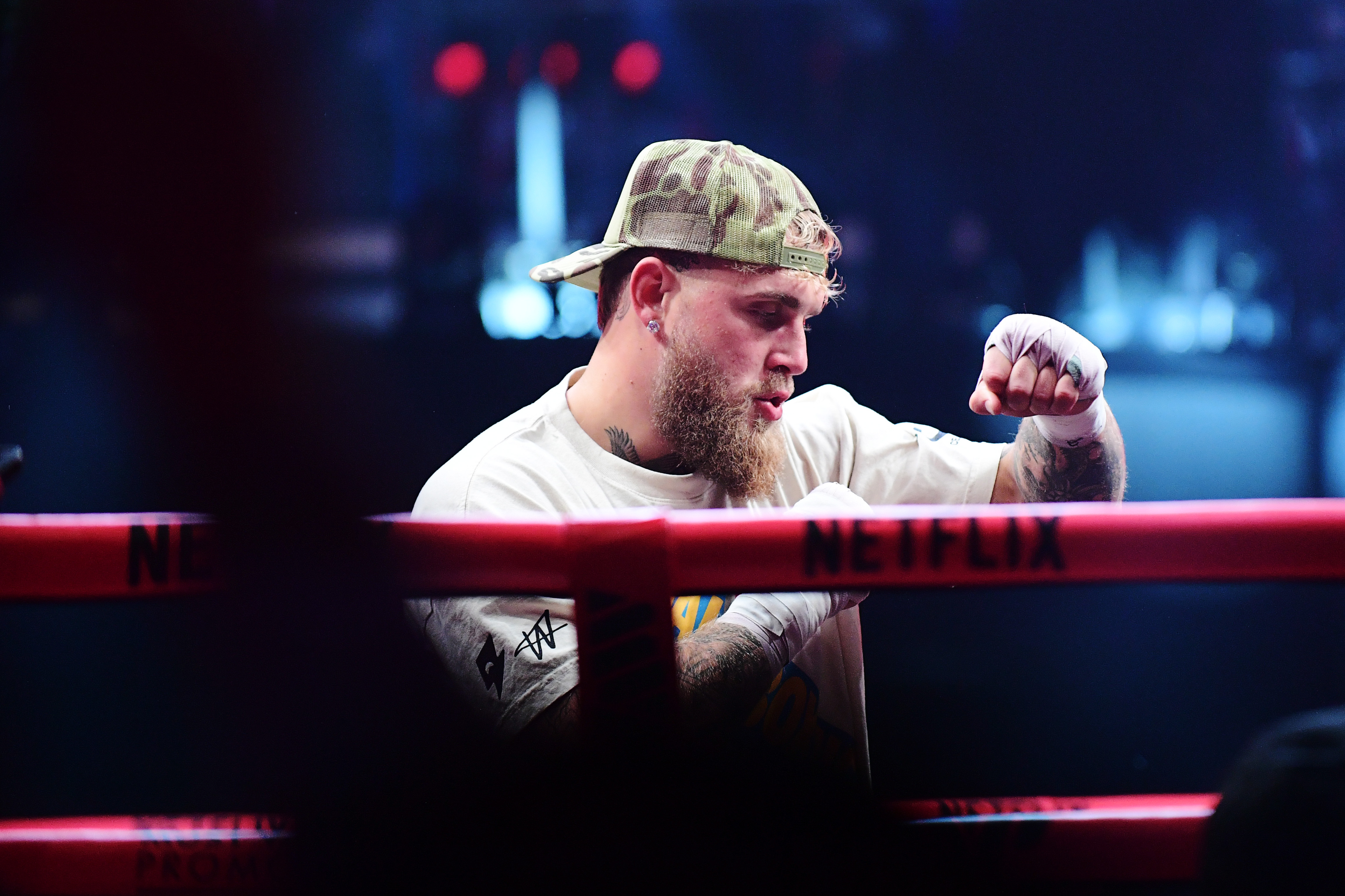 Jake Paul warms up in the ring during open workouts as we offer our best Jake Paul vs. Anthony Joshua prediction.