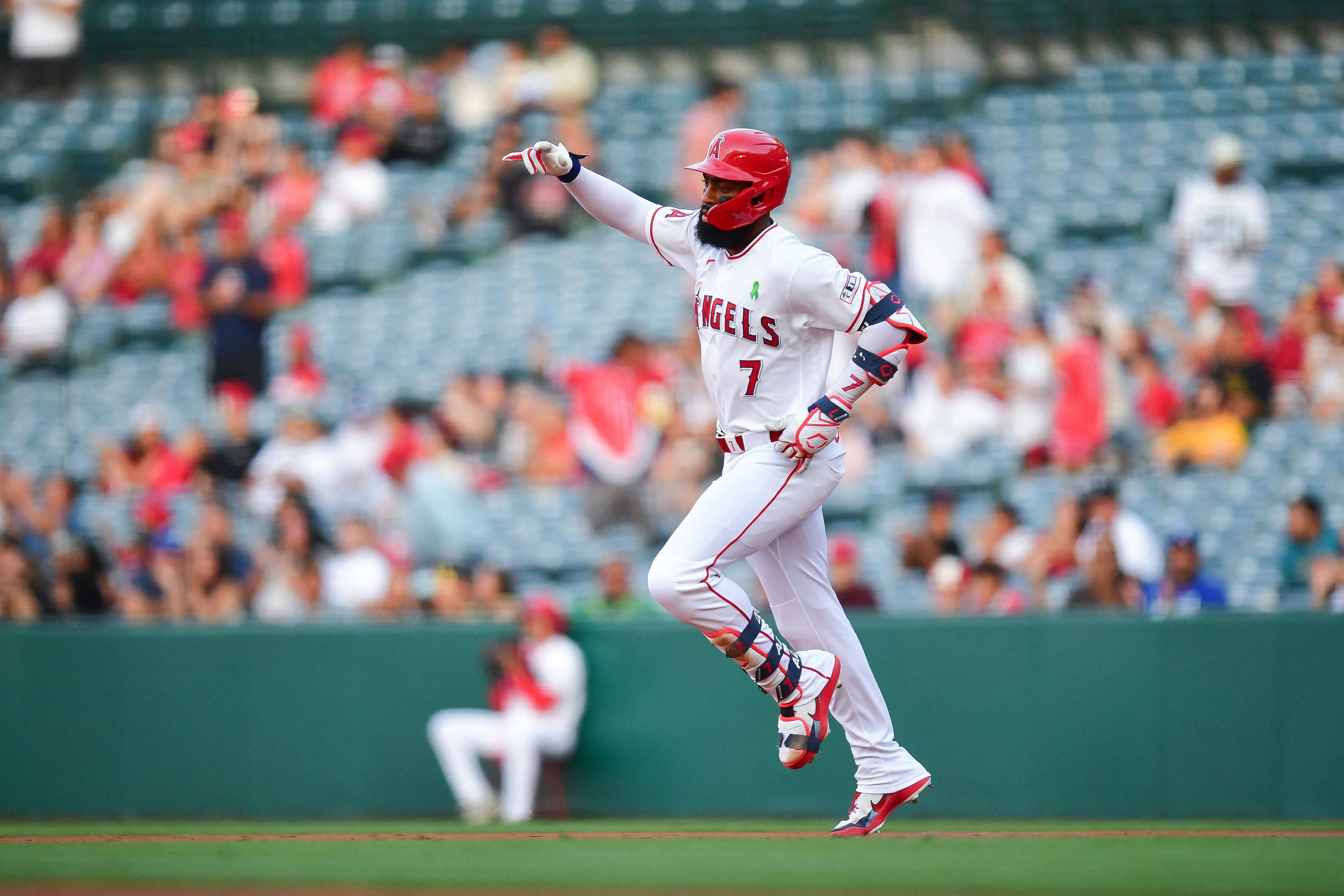 Los Angeles Angels right fielder Jo Adell runs the bases after hitting a solo home run as we make our best home run predictions today.