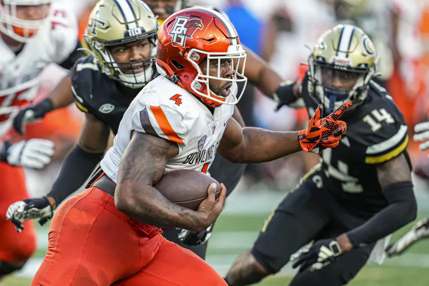 Bowling Green Falcons running back Terion Stewart runs the ball as we make our best Bowling Green vs. Central Michigan prediction.