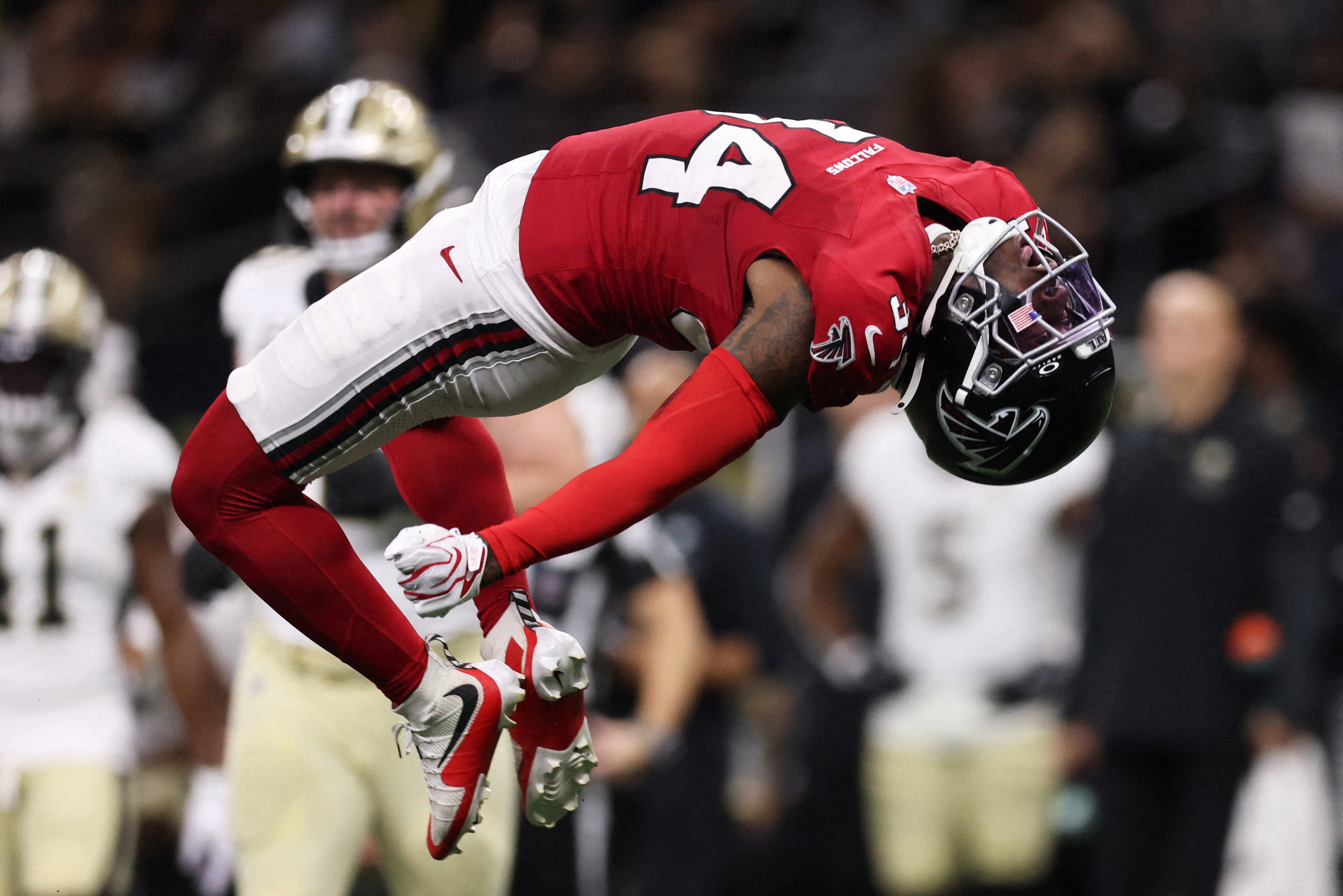 Atlanta Falcons safety Xavier Watts celebrates after a sack as we look at the prediction market trading numbers for the weekend.
