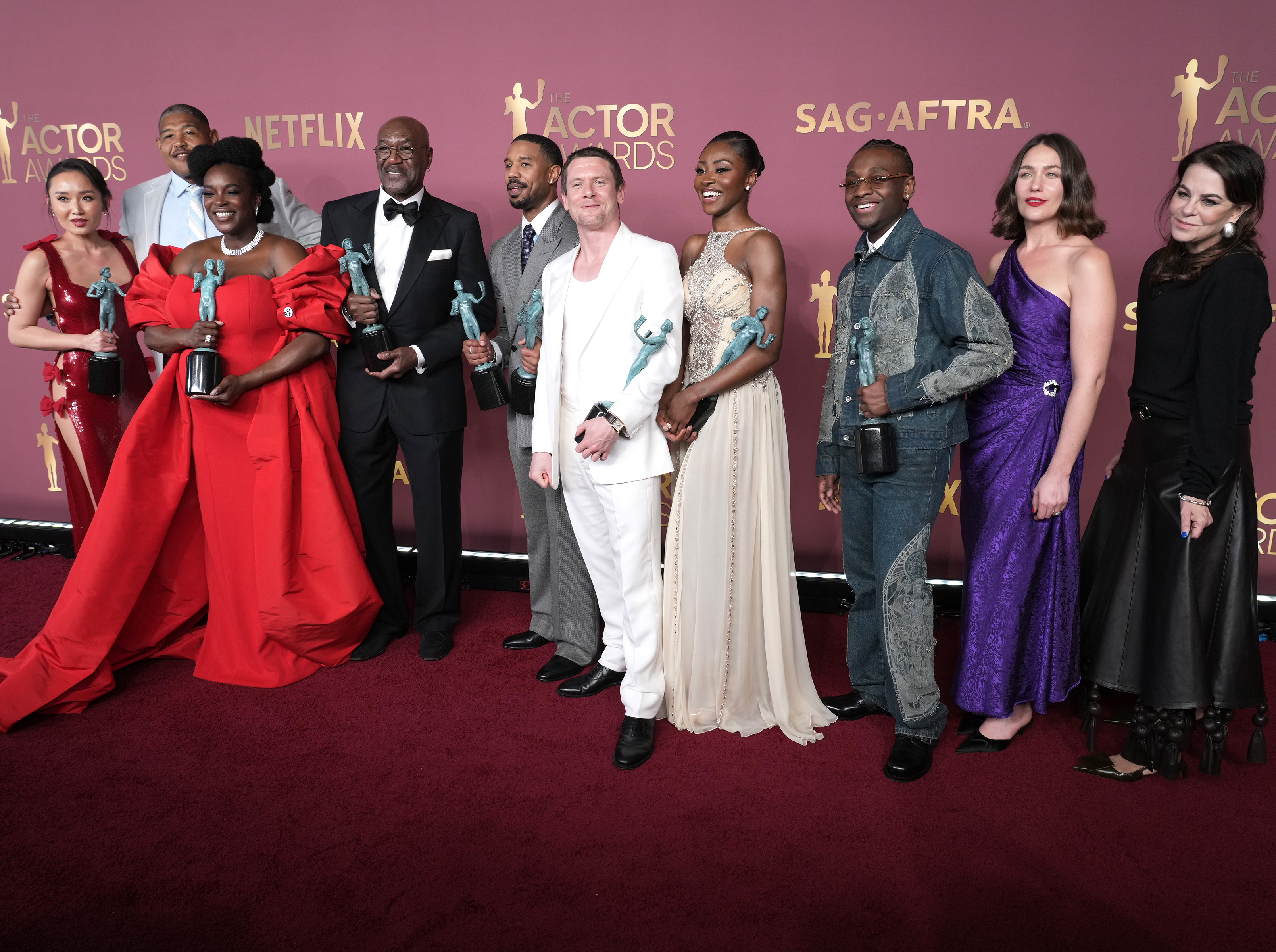 (L-R) Li Jun Li, Omar Benson Miller, Wunmi Mosaku, Delroy Lindo, Michael B. Jordan, Jack O'Connell, Jayme Lawson, Miles Caton, Lola Kirke and Francine Maisler, winners of the Outstanding Performance by a Cast in a Motion Picture award for "Sinners" as we 