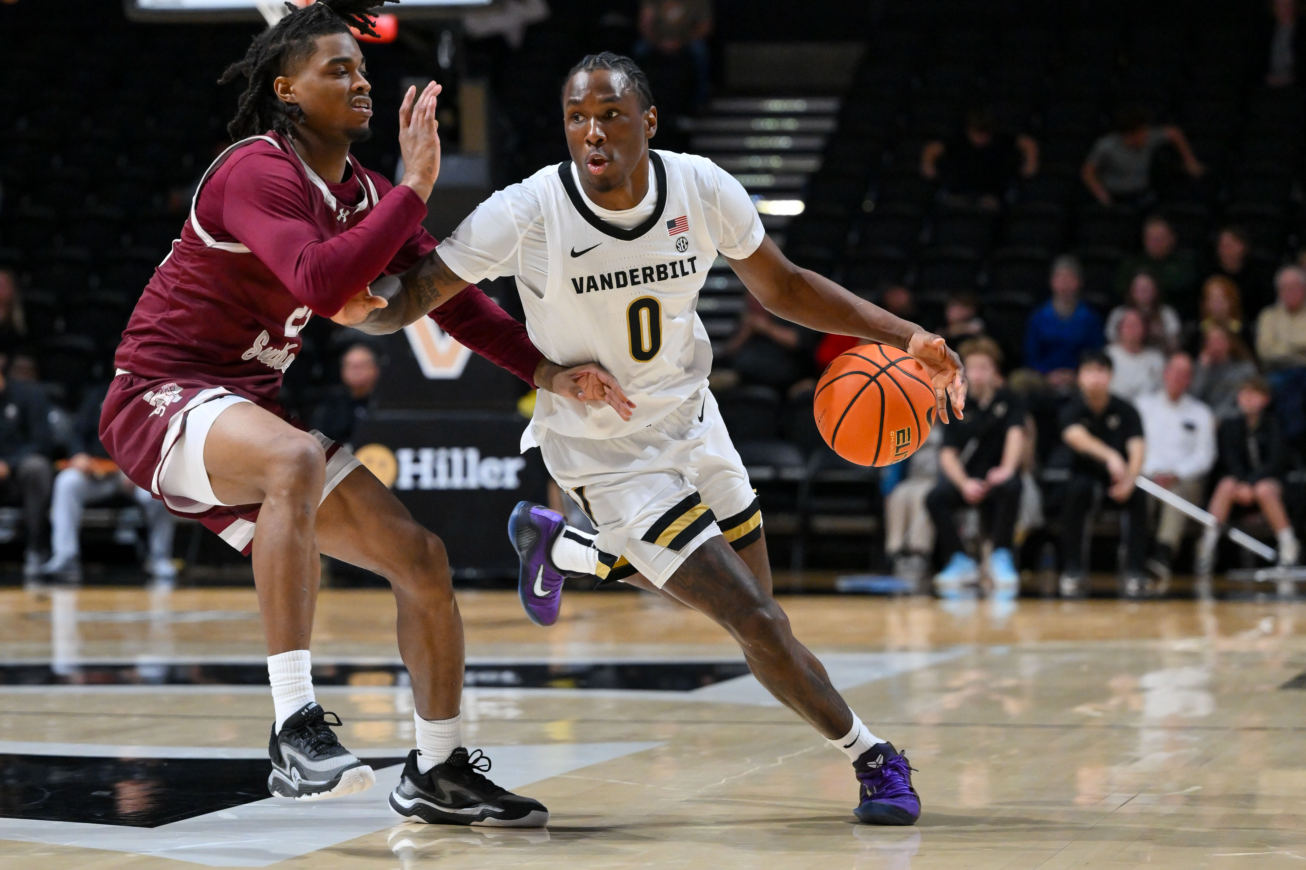 Vanderbilt Commodores guard Mike James dribbles the ball as we make our best Vanderbilt vs. Western Kentucky prediction.