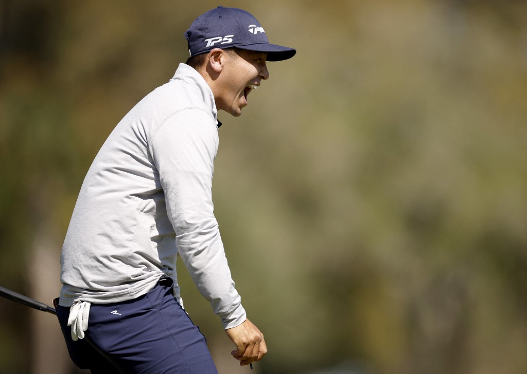Kurt Kitayama smiles during a practice round prior to THE PLAYERS Championship as we look at the top Players Championship odds boosts.