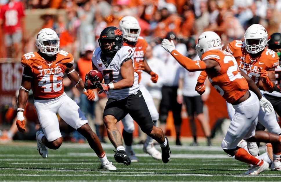 Warren's 2 TDs help No. 19 Oklahoma St. top No. 21 Baylor