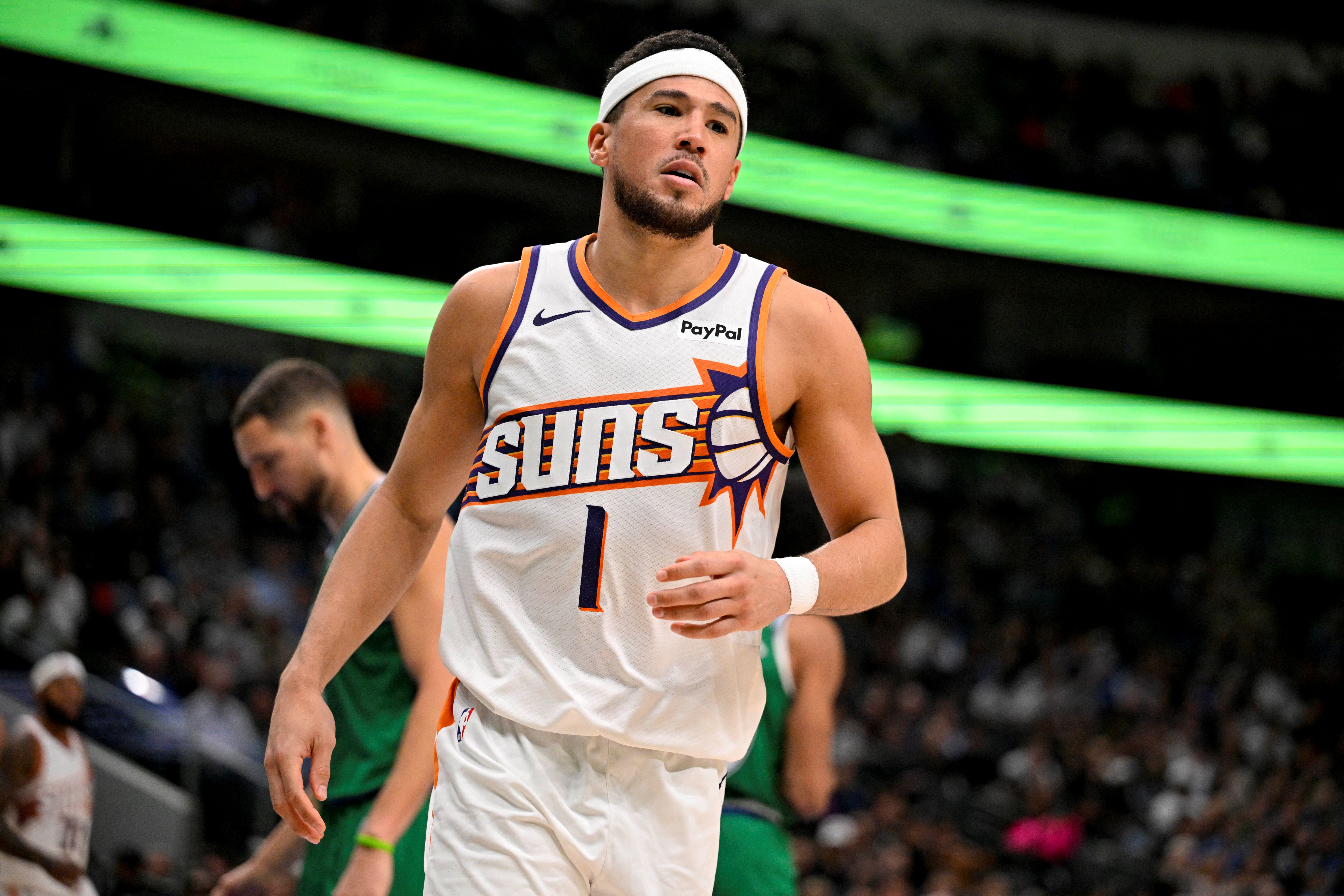 Phoenix Suns guard Devin Booker (1) reacts as we break down our NBA player props today.