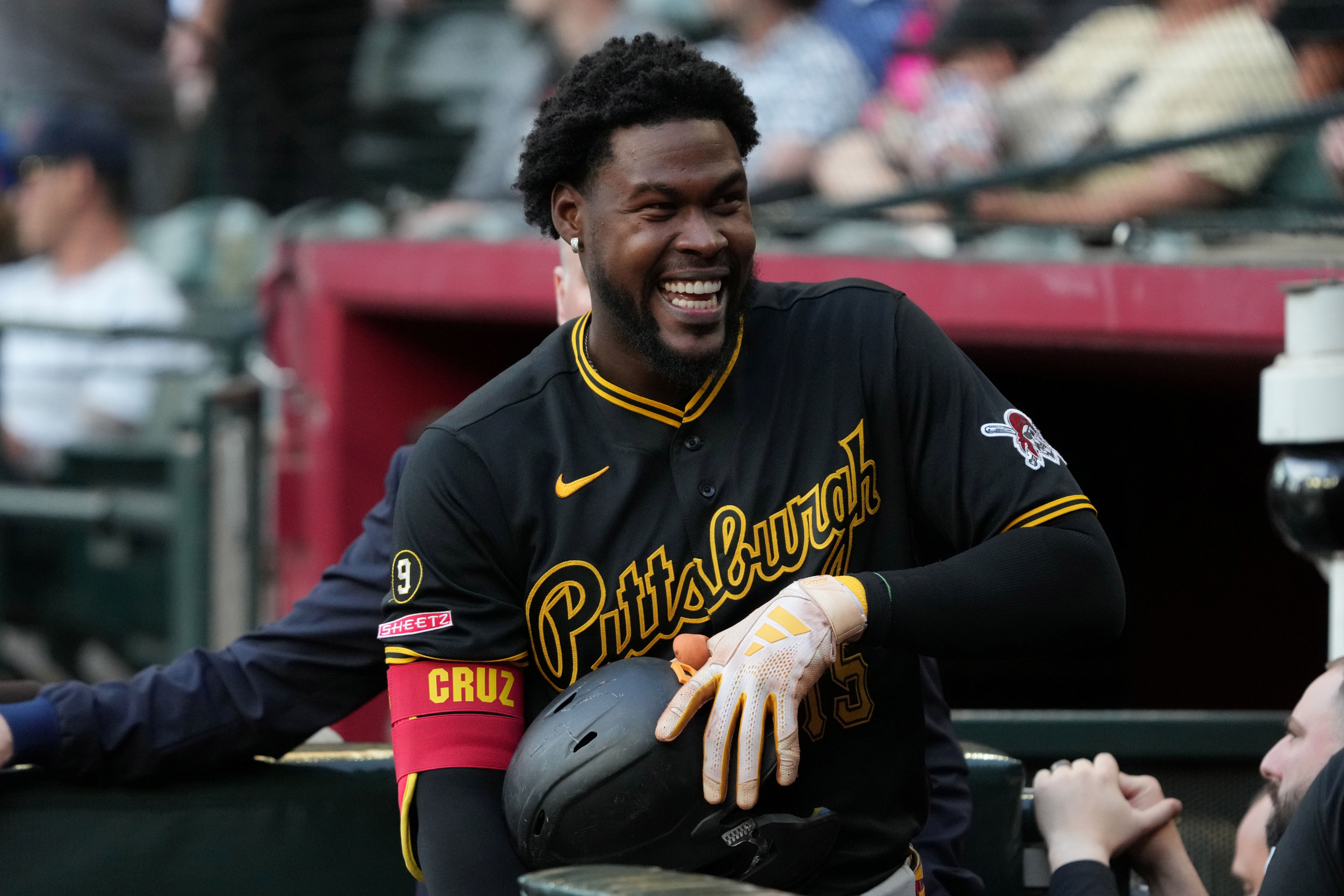 Pittsburgh Pirates outfielder Oneil Cruz (15), seen here getting ready to play a game, is featured in our home run predictions tonight.