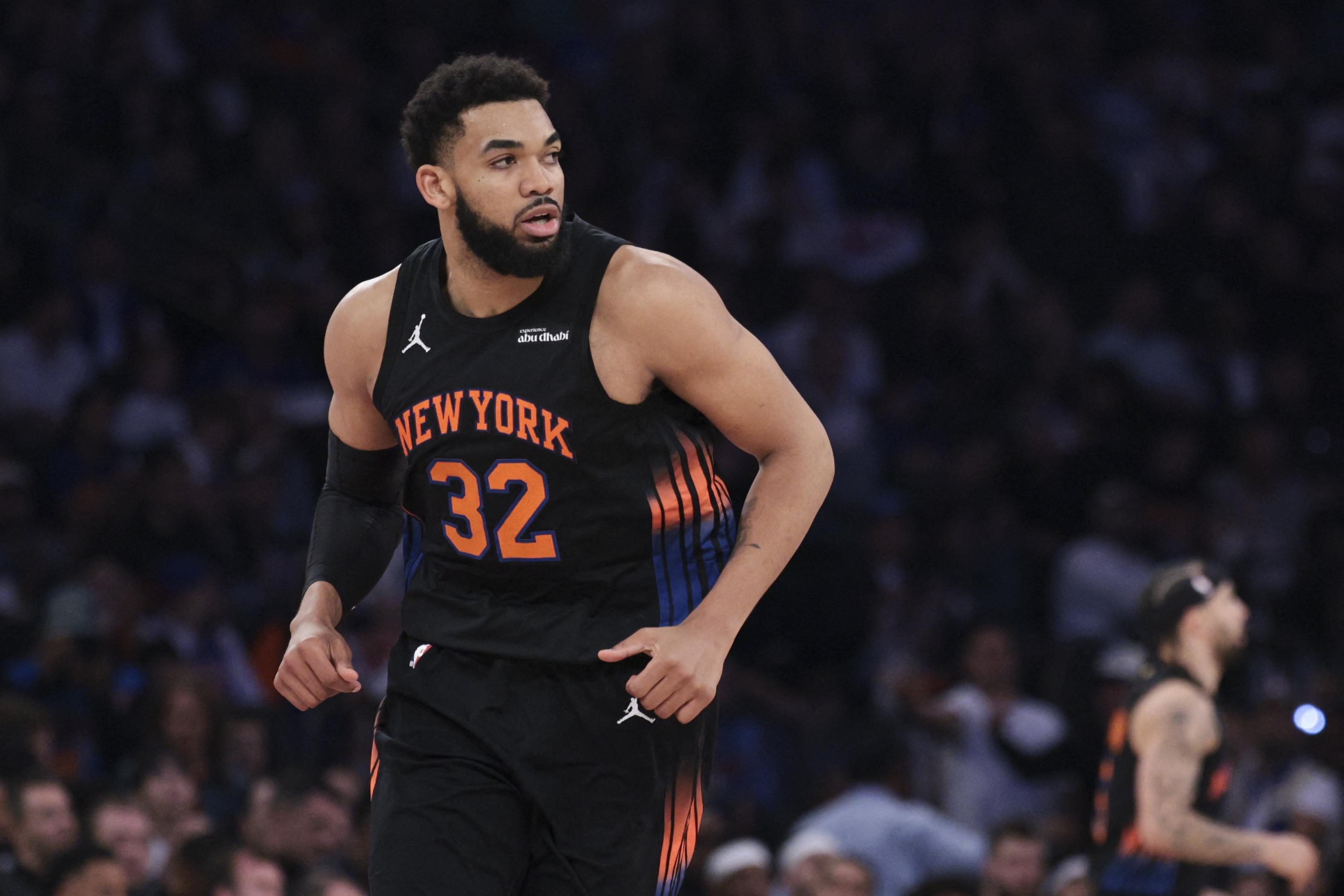 New York Knicks center Karl-Anthony Towns (32), seen here reacting during a game, is featured in our Knicks vs. Cavaliers player props for Game 3 today.