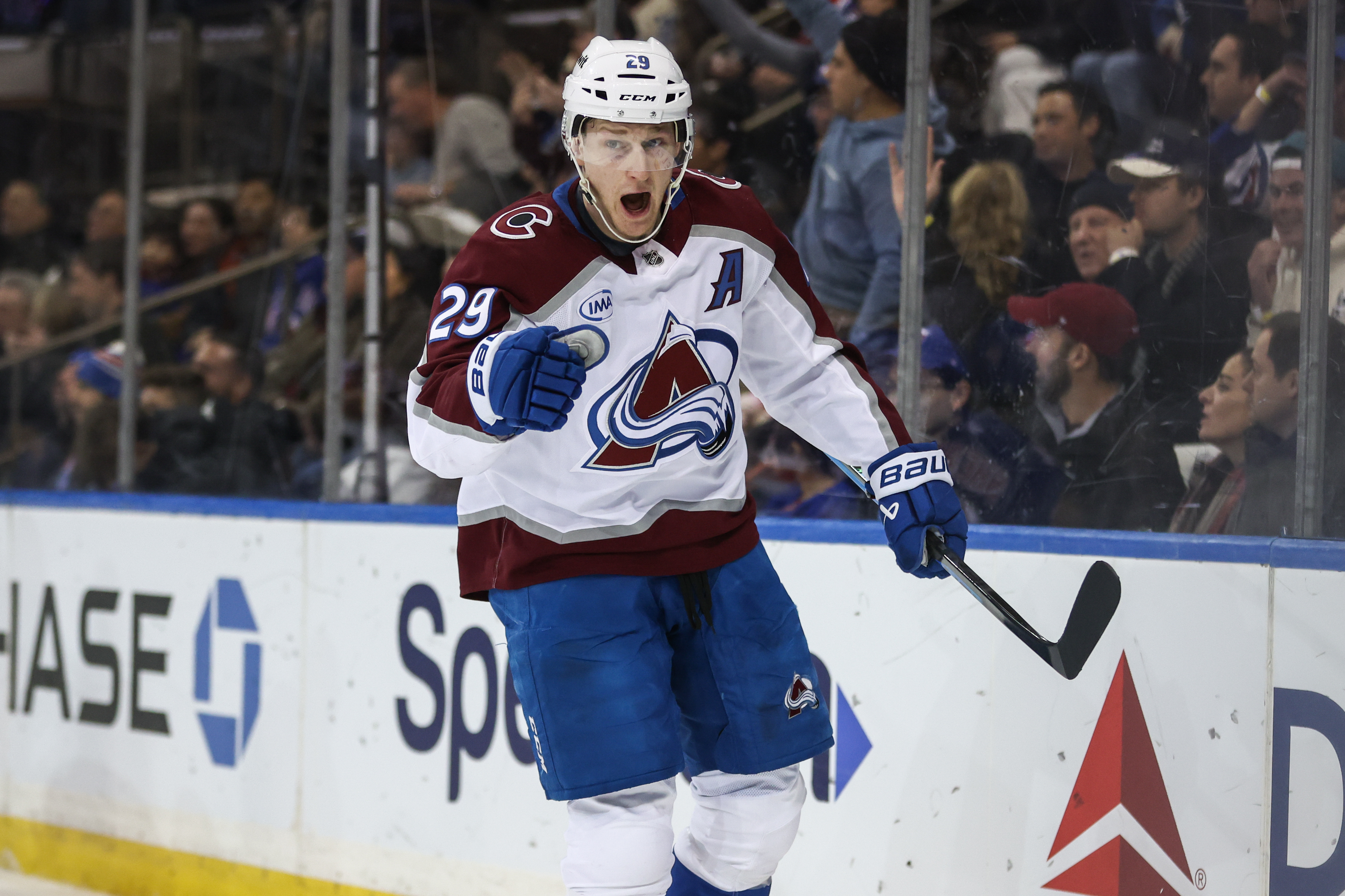 Colorado Avalanche center Nathan MacKinnon (29) celebrates after scoring as we offer our NHL anytime goal scorer predictions today.