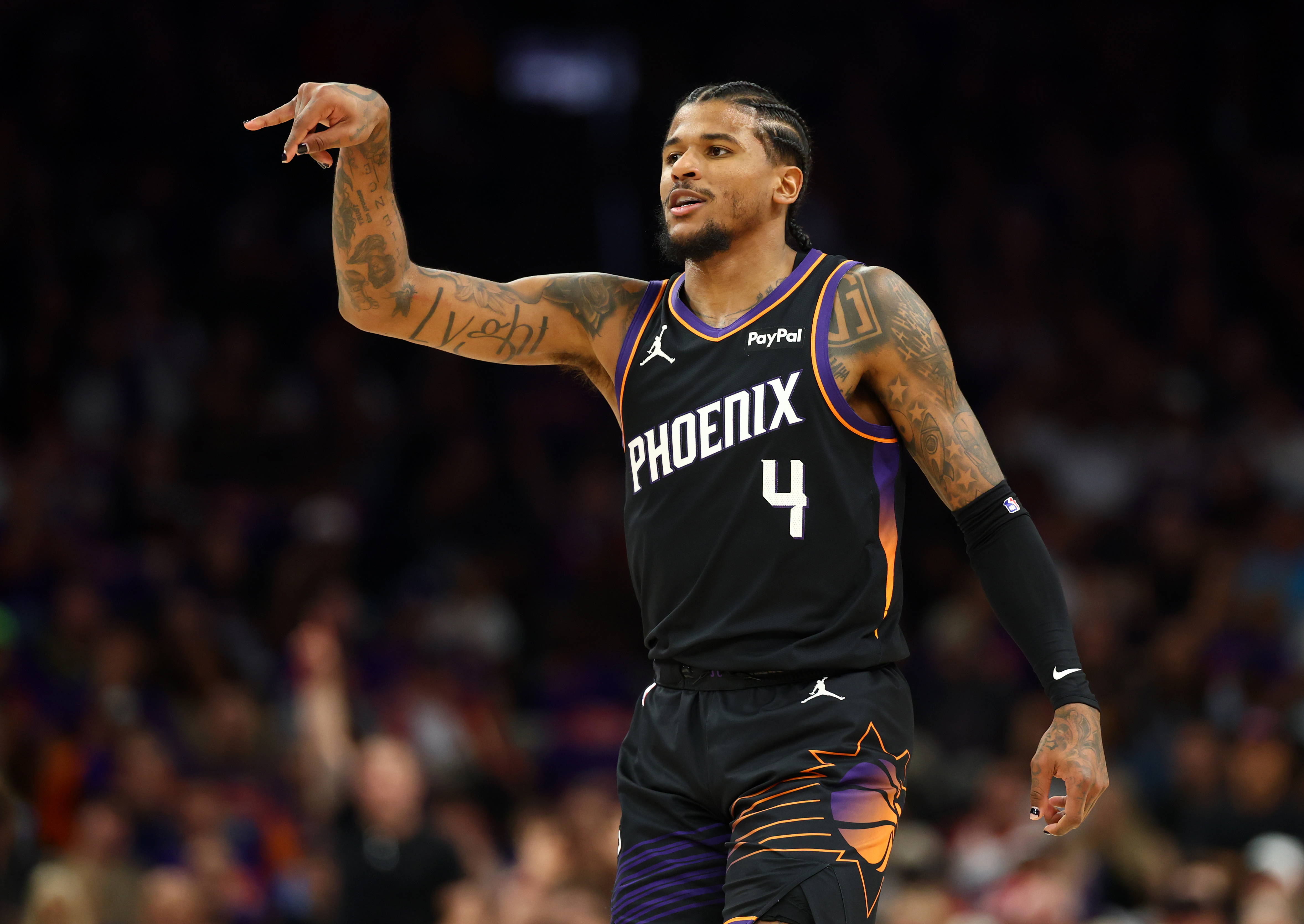 Phoenix Suns guard Jalen Green (4), seen here during a game, is featured in our Warriors vs. Suns player props tonight.