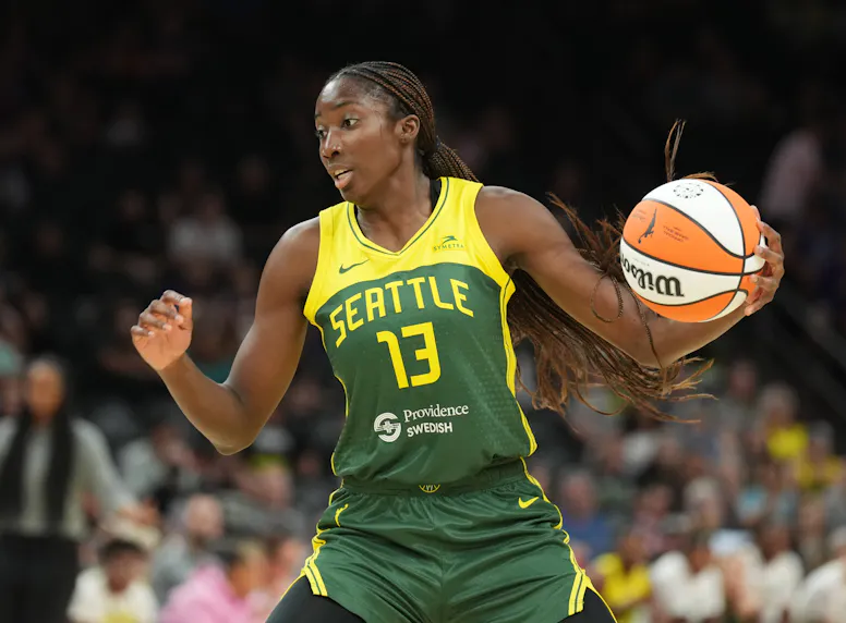 Seattle Storm center Ezi Magbegor (13) dribbles the ball as we offer our best Wings vs. Storm prediction and expert picks for Monday's WNBA matchup at Climate Pledge Arena in Seattle.