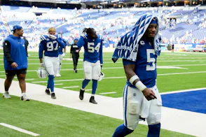 Indianapolis Colts quarterback Anthony Richardson walks off the field as we look at the Indiana casino and sports betting financials for August 2024.
