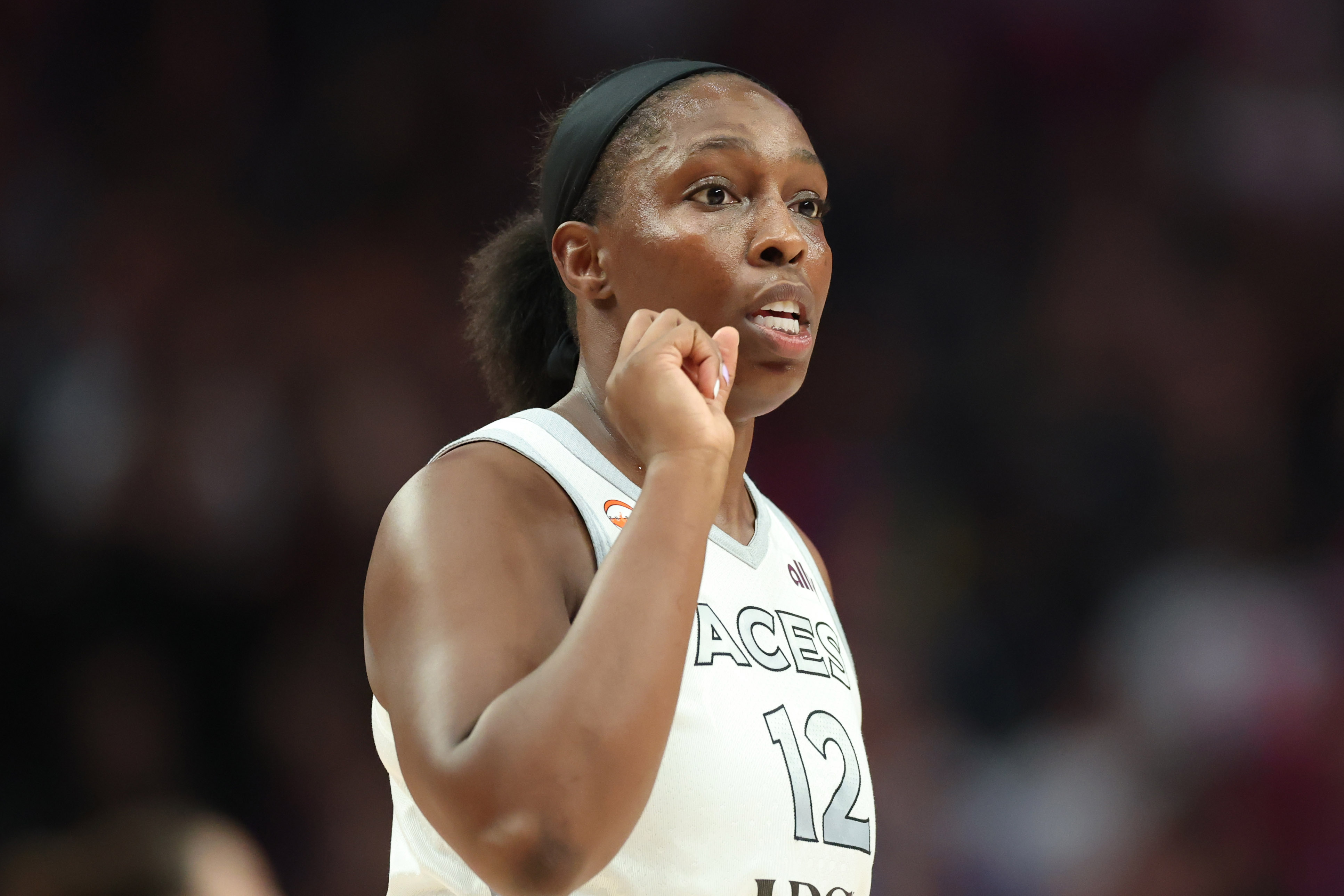 Las Vegas Aces guard Chelsea Gray (12) looks on during the first half against the Portland Fire at Moda Center.