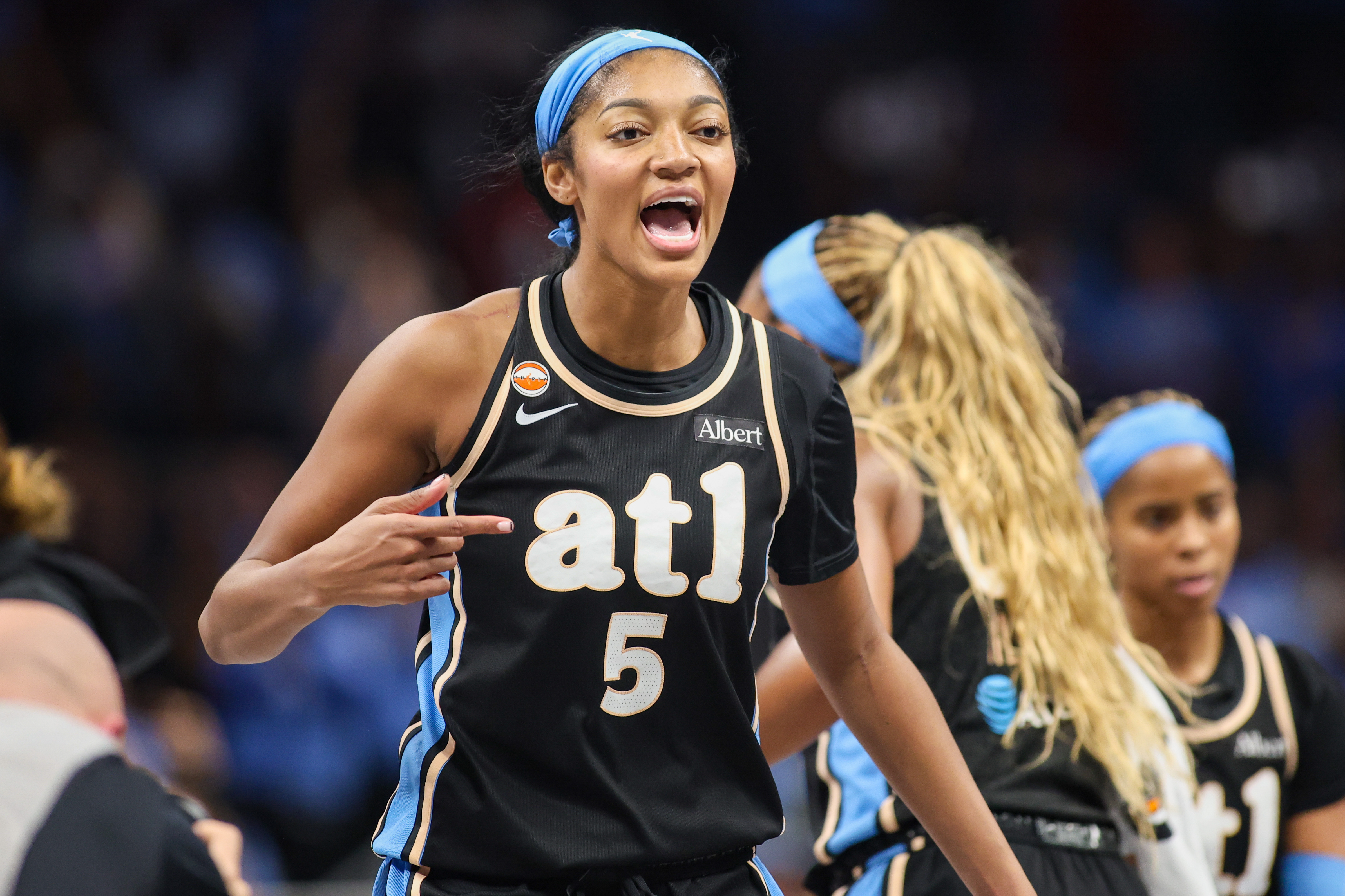 Atlanta Dream forward Angel Reese (5) reacts during a timeout against the Washington Mystics as we make our best Dream vs. Mystics prediction. 