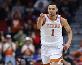 Dylan Disu #1 of the Texas Longhorns reacts after his made basket as we look at our best Xavier vs. Texas prediction
