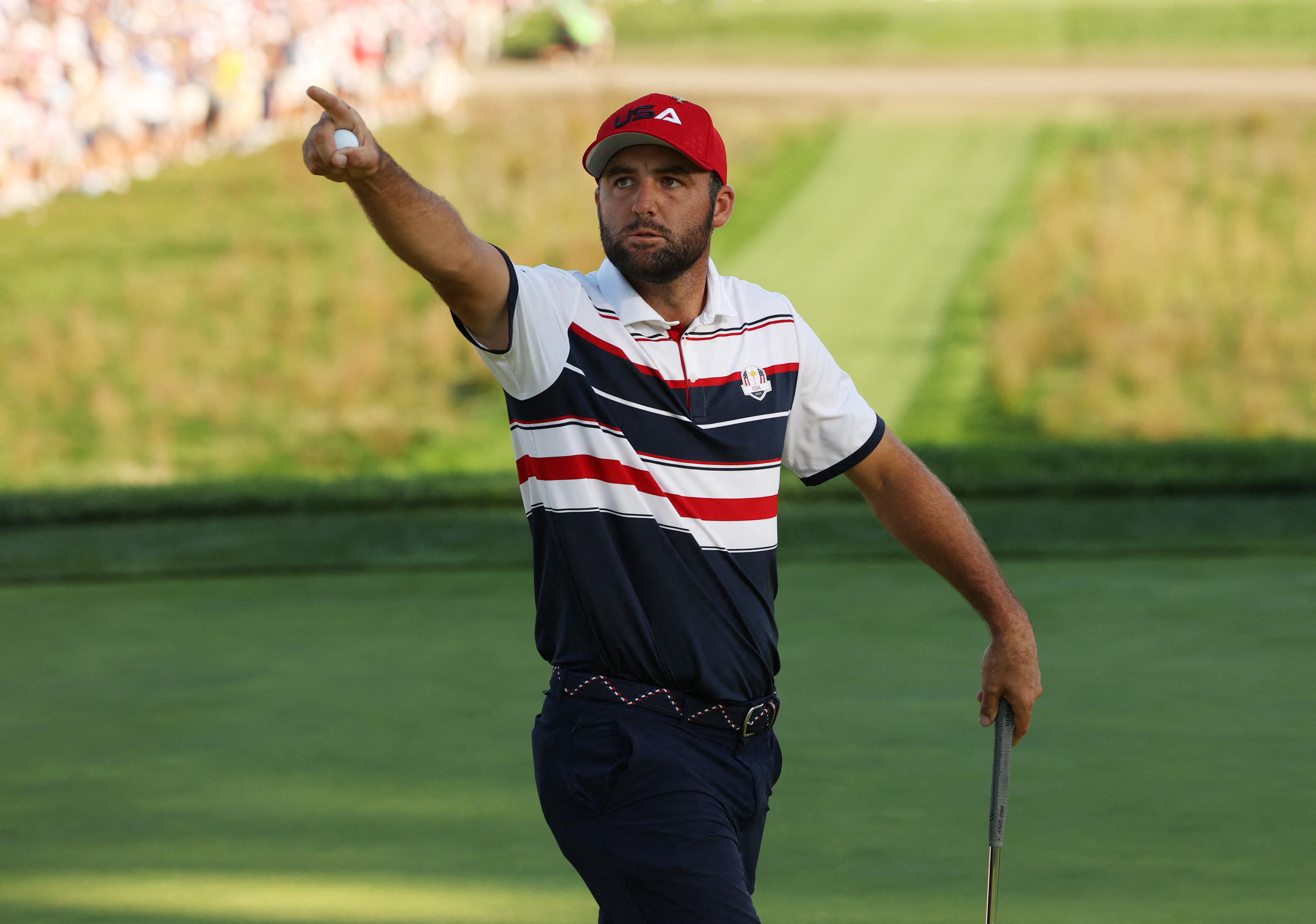 Scottie Scheffler celebrates after holing his putt on the 17th hole as we look at the 2026 Masters odds entering the PGA Tour season