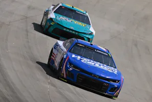 Kyle Larson and Denny Hamlin race as we offer our NASCAR Cup Series Championship odds and predictions for the 2024 season.