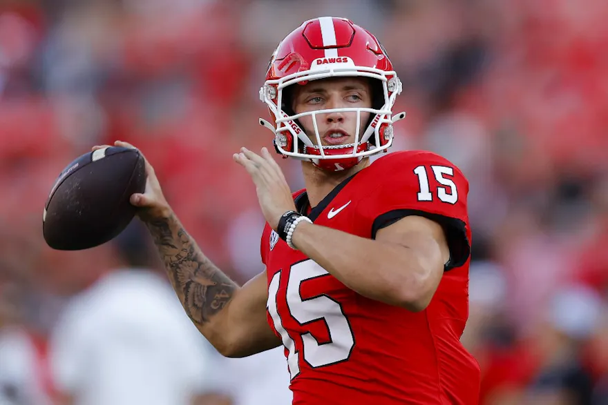 Carson Beck of the Georgia Bulldogs warms up prior to the game against the UAB Blazers at Sanford Stadium as we look at our Kentucky-Georgia prediction.