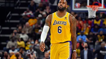LeBron James of the Los Angeles Lakers reacts during the second half against the Memphis Grizzlies, and he was involved in a decision by the Massachusetts Gaming Commission due to incorrectly priced player props for James at DraftKings.