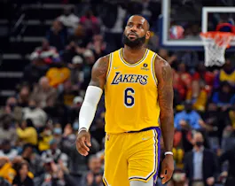 LeBron James of the Los Angeles Lakers reacts during the second half against the Memphis Grizzlies, and he was involved in a decision by the Massachusetts Gaming Commission due to incorrectly priced player props for James at DraftKings.