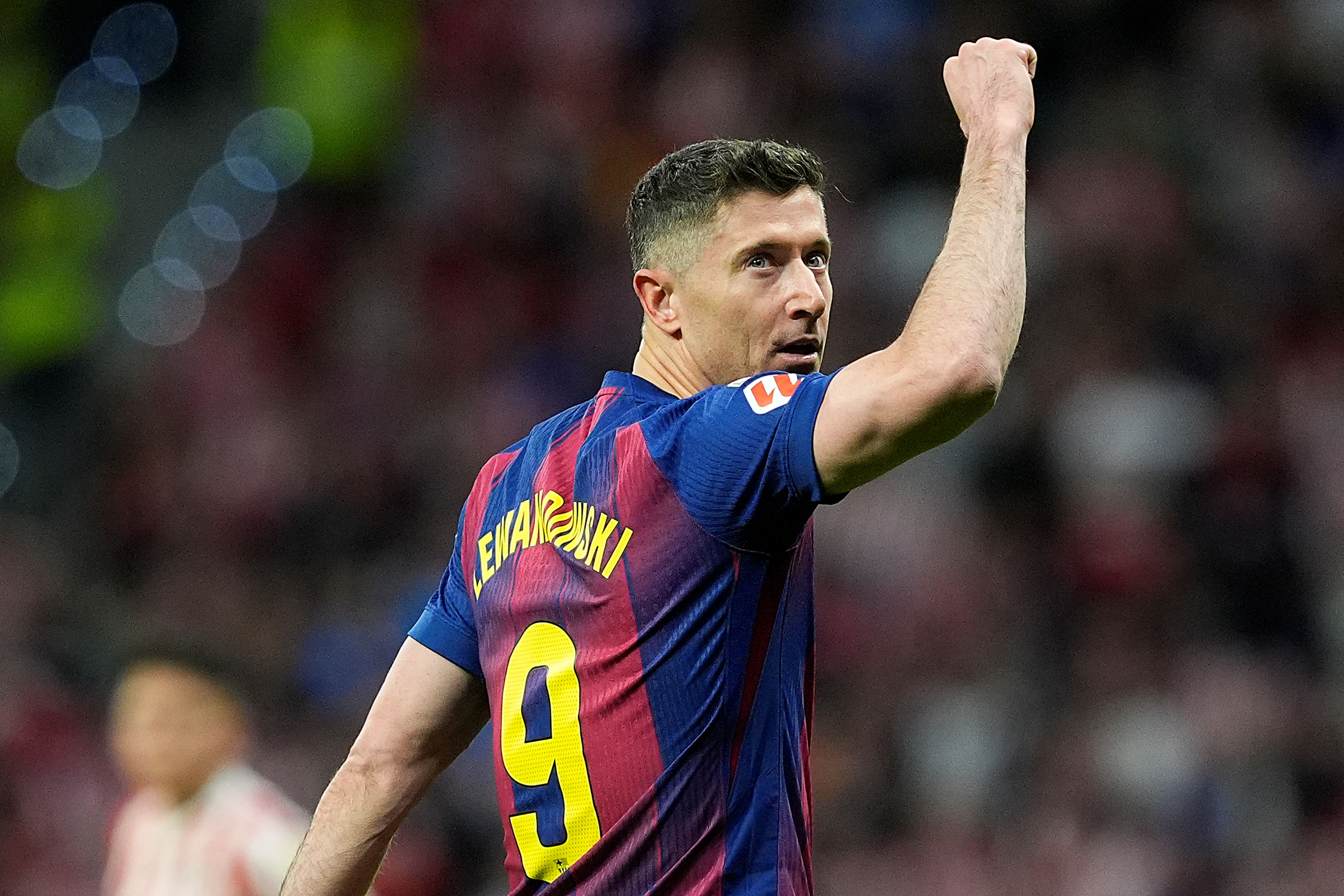 FC Barcelona's Robert Lewandowski celebrates a goal, and he's key as we look at our Atletico Madrid vs. Barcelona prediction.