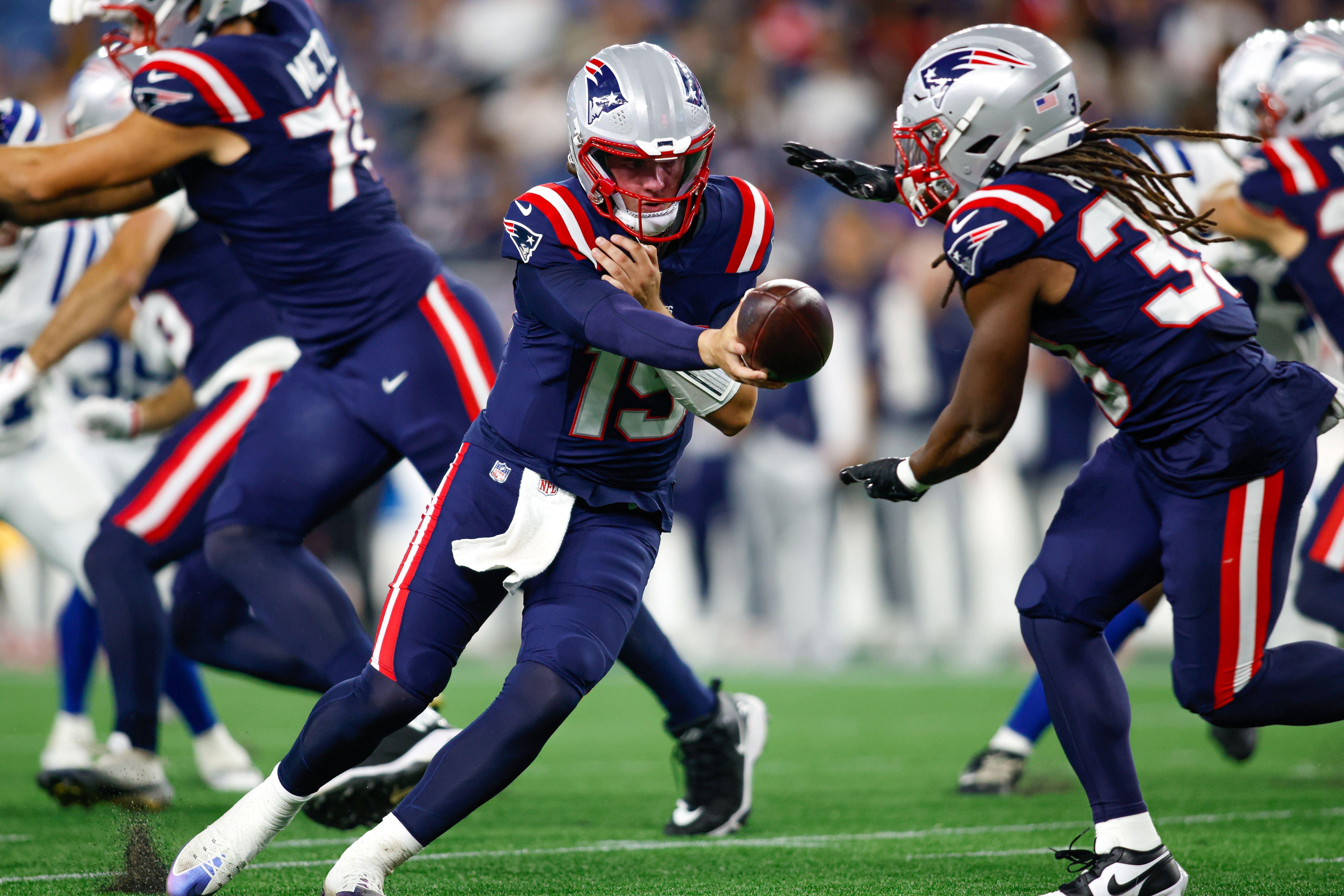 New England Patriots quarterback Behren Morton hands the ball to JaMycal Hasty as we make our best Eagles vs. Patriots prediction.