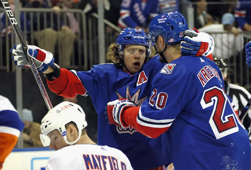 Artemi Panarin and Mika Zibanejad of the New York Rangers celebrate a second-period goal by Kreider before it was disallowed after a video review against the New York Islanders at Madison Square Garden on November 08, 2022 in New York City.