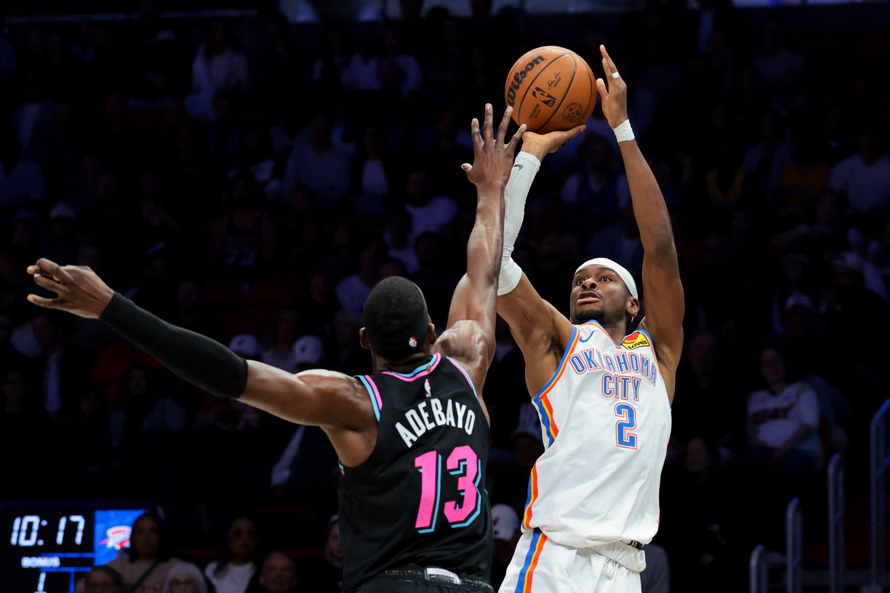 Heat center Bam Adebayo defends Thunder guard Shai Gilgeous-Alexander as we analyze the latest 2026-27 NBA championship odds.