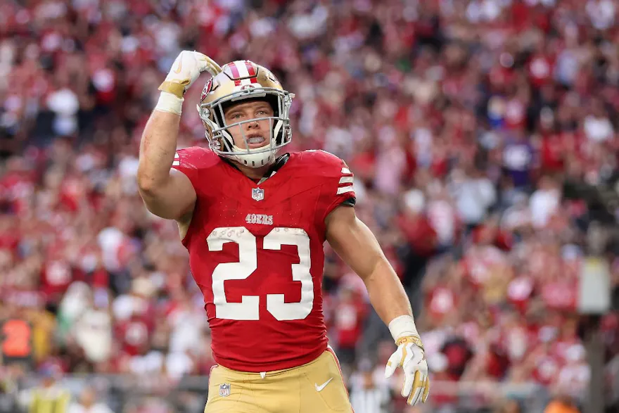 Running back Christian McCaffrey of the San Francisco 49ers celebrates after scoring a five-yard rushing touchdown against the Arizona Cardinals as we look at our Super bowl anytime touchdown scorer prop picks.