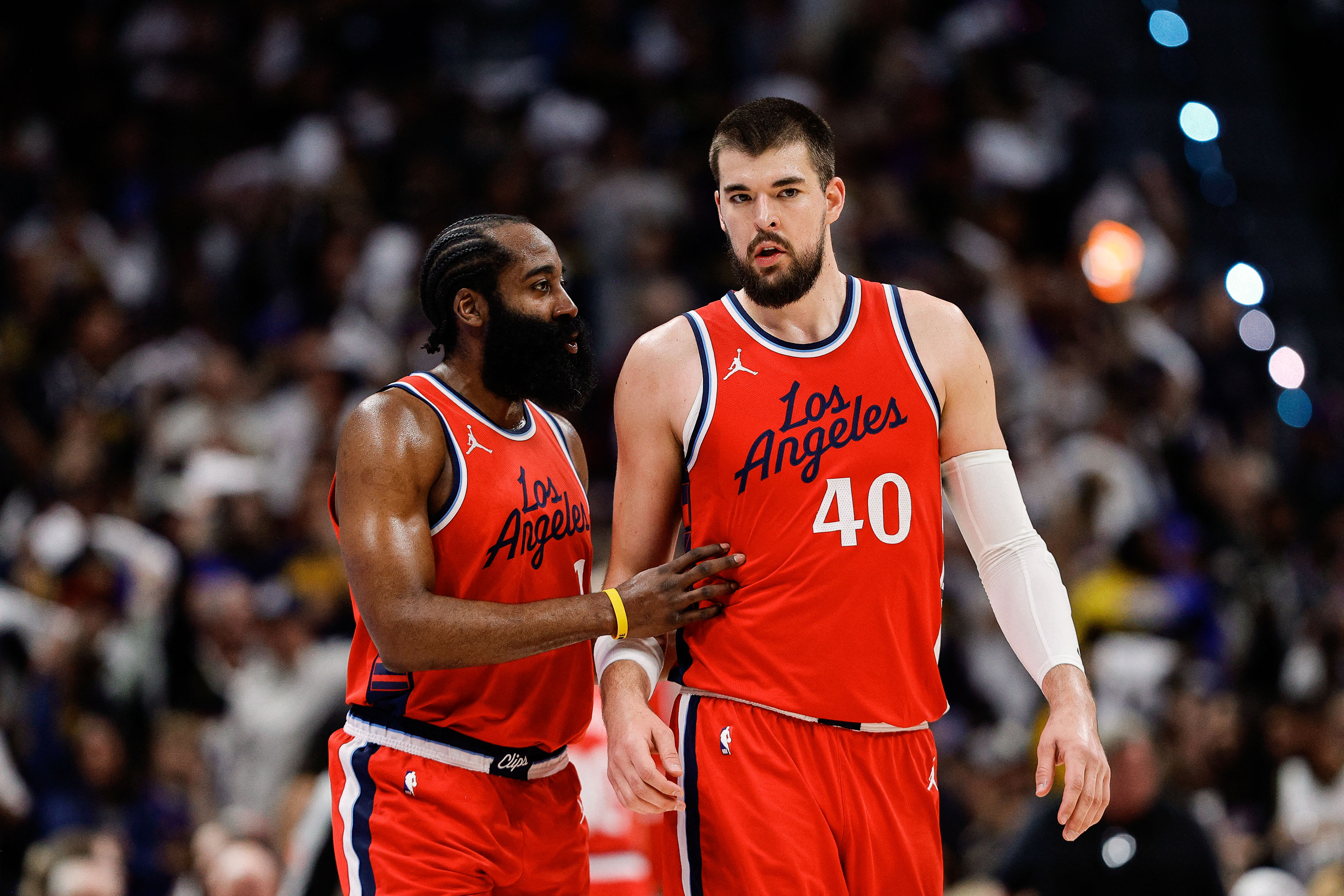 Los Angeles Clippers guard James Harden (1) and center Ivica Zubac (40), seen here during a game, are featured in our Clippers vs. Jazz player props.